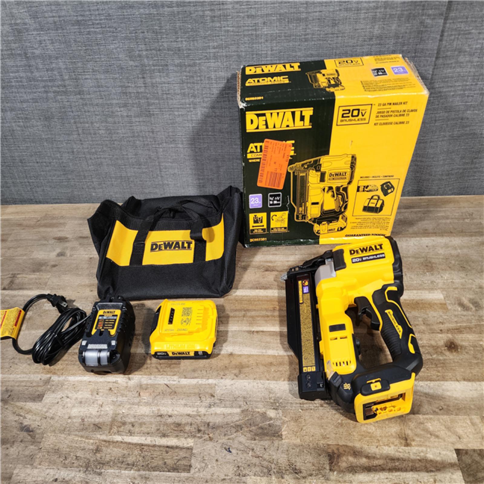 HOUSTON LOCATION - AS-IS DEWALT ATOMIC 20V MAX Lithium Ion Cordless 23 Gauge Pin Nailer Kit