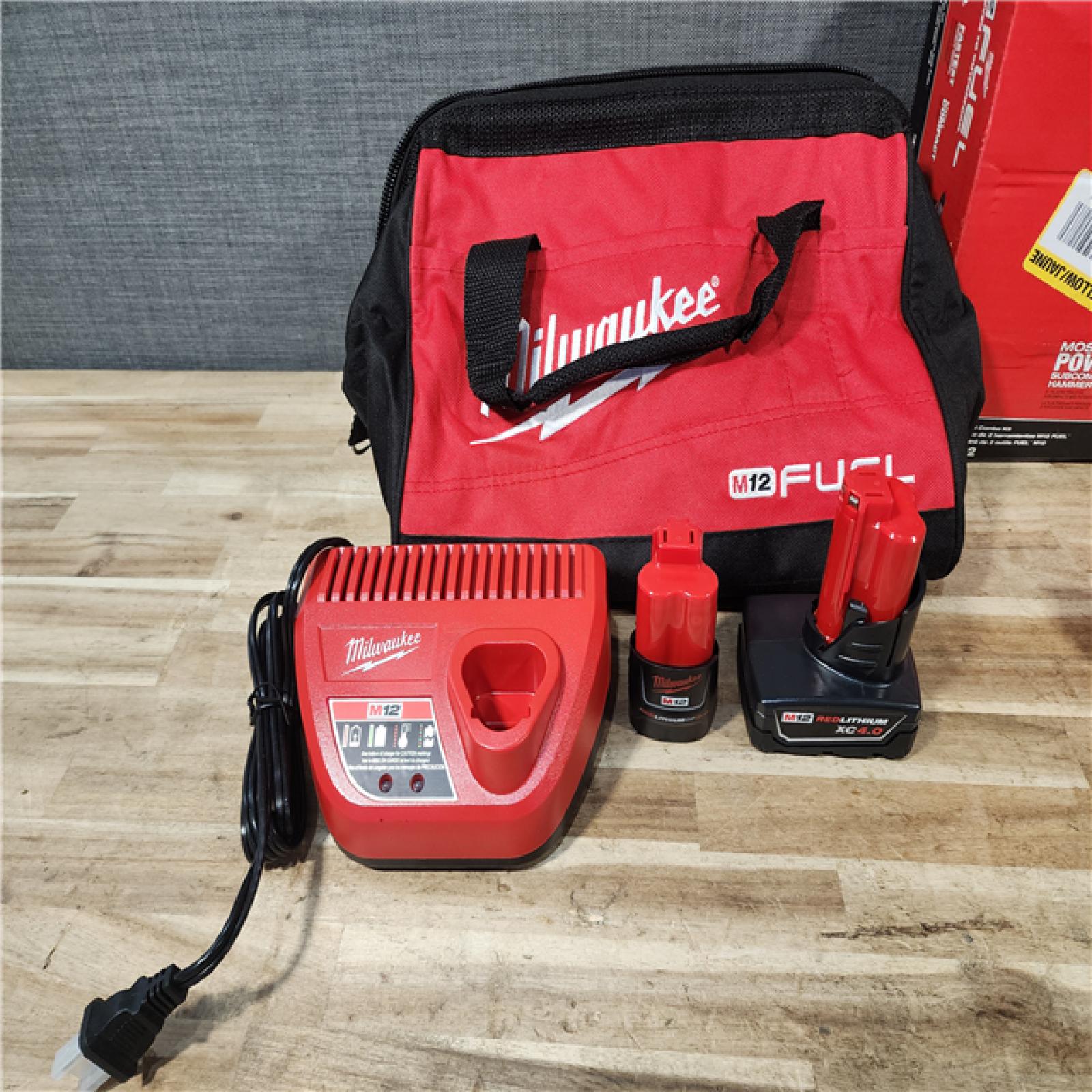 HOUSTON LOCATION - AS-IS Milwaukee FUEL 12-Volt Lithium-Ion Brushless Cordless Hammer Drill and Impact Driver Combo Kit