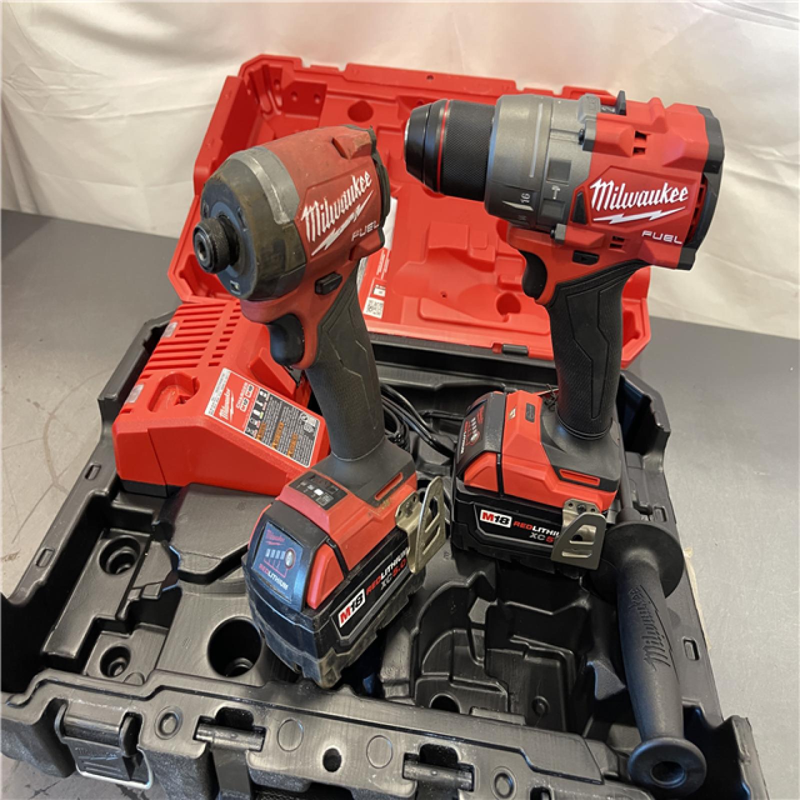 AS-IS - MILWAUKEE M18 FUEL 18V Lithium-Ion Brushless Cordless Hammer Drill and Impact Driver Combo Kit