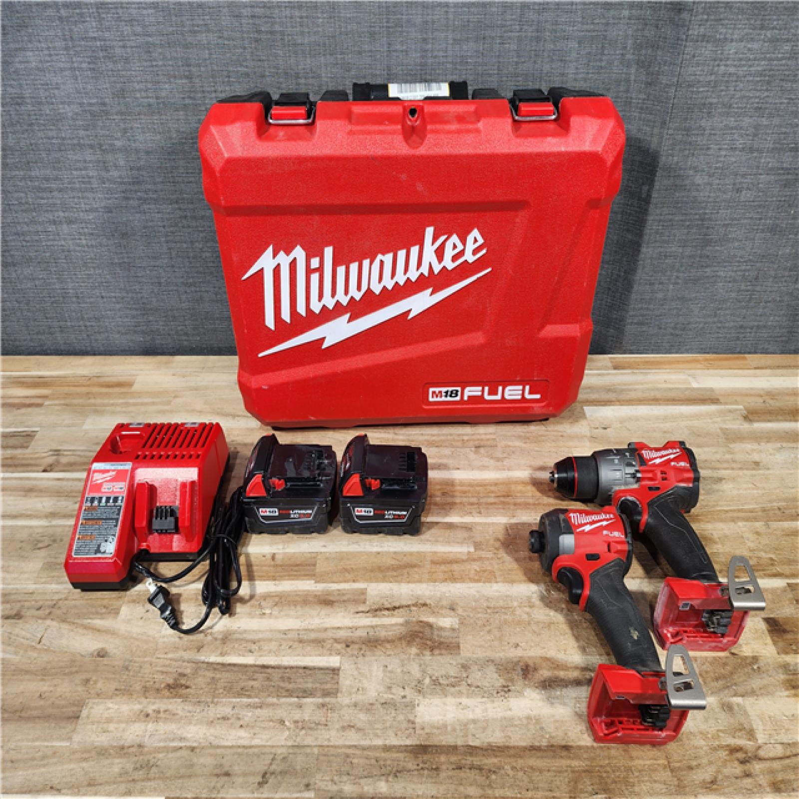 HOUSTON LOCATION - AS-IS Milwaukee FUEL 18V Lithium-Ion Brushless Cordless Hammer Drill and Impact Driver Combo Kit