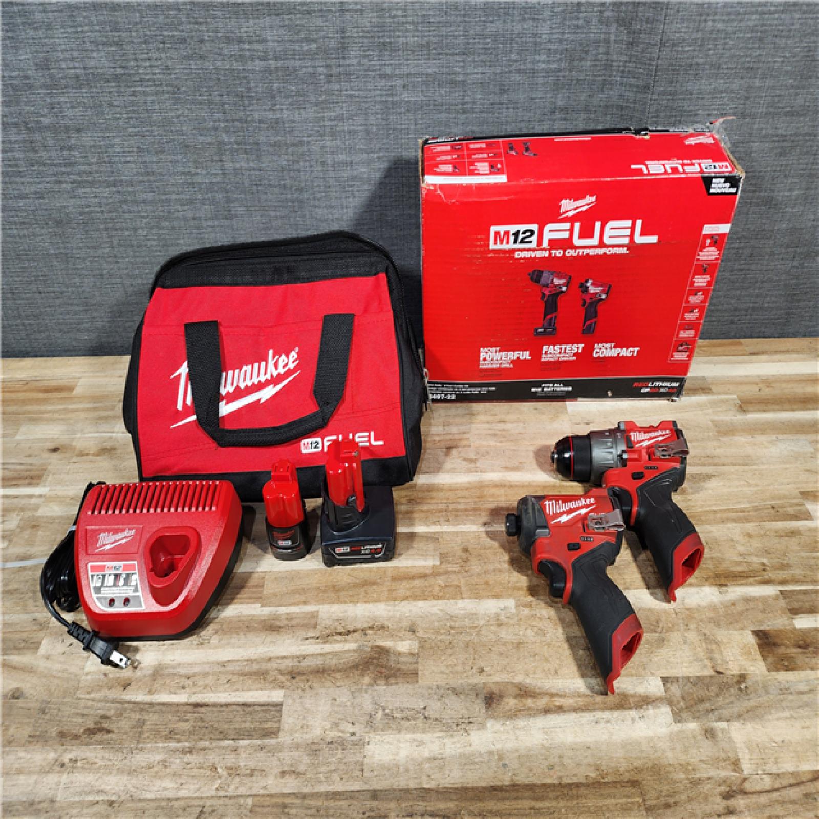 HOUSTON LOCATION - AS-IS Milwaukee FUEL 12-Volt Lithium-Ion Brushless Cordless Hammer Drill and Impact Driver Combo Kit