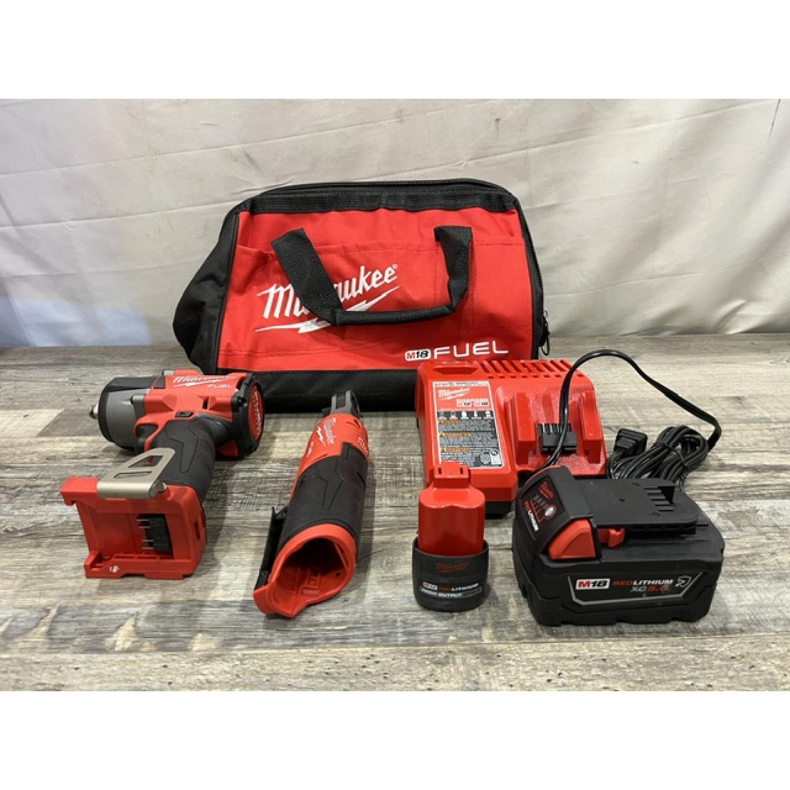 AS-IS Milwaukee FUEL 18V Cordless Mid Torque 1/2 in. Impact Wrench w/ 12 FUEL 3/8 in. Ratchet Combo Kit