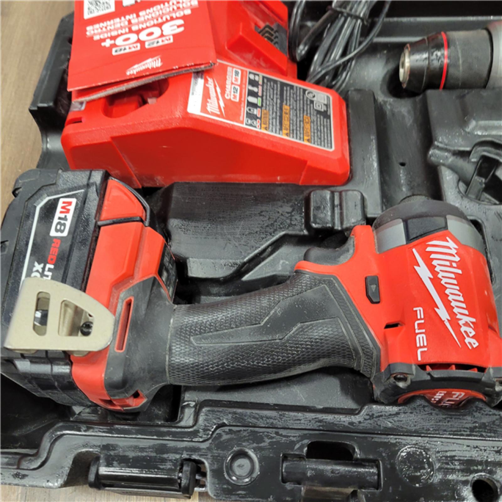 AS-IS Milwaukee M18 FUEL 18V Lithium-Ion Brushless Cordless Hammer Drill and Impact Driver Combo Kit (2-Tool) with 2 Batteries