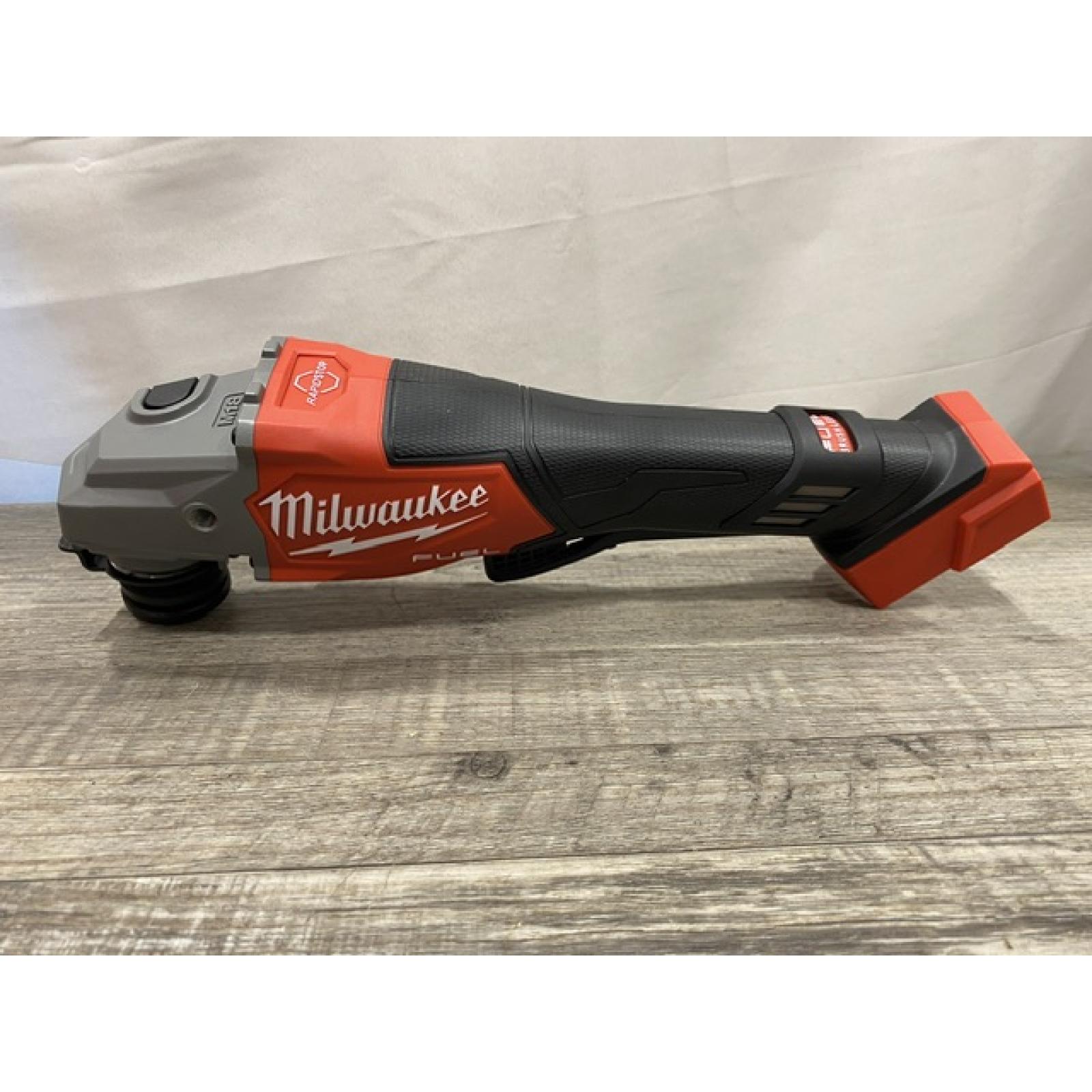 AS-IS Milwaukee FUEL 18-Volt Lithium-Ion Brushless Cordless 4-1/2 in./6 in. Braking Grinder with Paddle Switch (Tool-Only)