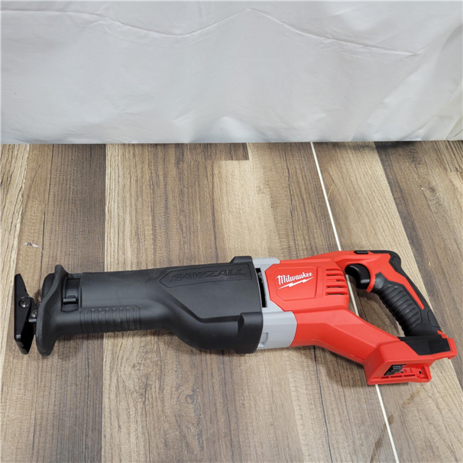 AS-IS  MILWAUKEE M18 18V Lithium-Ion Cordless Combo Tool Kit with Two 3.0Ah Batteries, 1-Charger, 1-Tool Bag (4-Tool)