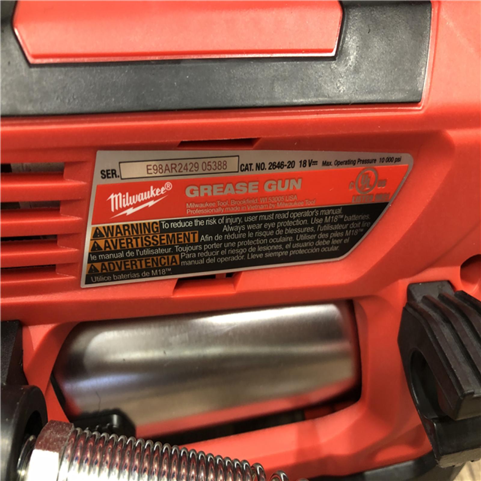AS-IS Milwaukee 18V Lithium-Ion Cordless Grease Gun 2-Speed with (1) 1.5Ah Batteries  Charger  Tool Bag