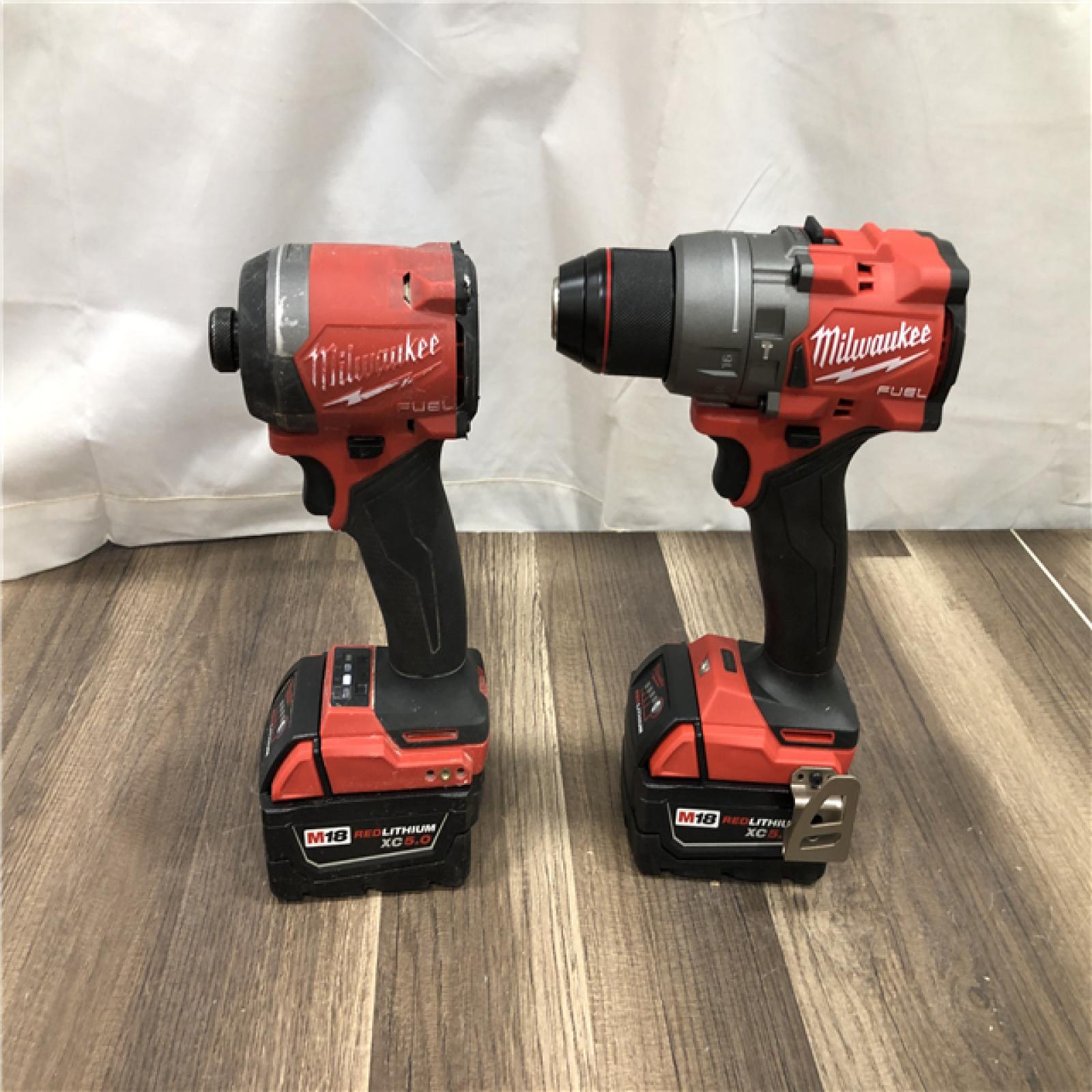 AS-IS Milwaukee FUEL 18V Lithium-Ion Brushless Cordless Hammer Drill and Impact Driver Combo Kit