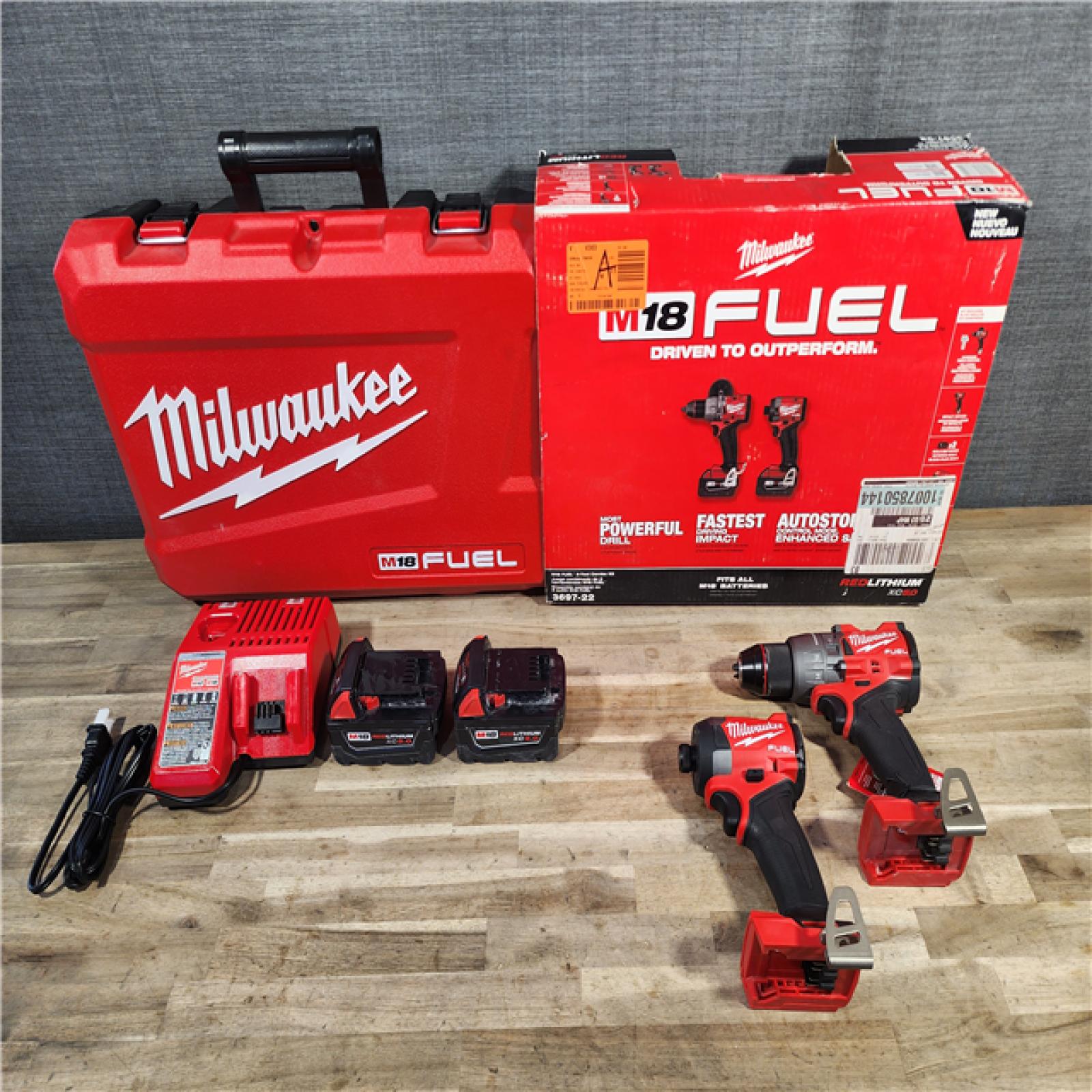 HOUSTON LOCATION - AS-IS MILWAUKEE FUEL 18V Lithium-Ion Brushless Cordless Hammer Drill and Impact Driver Combo Kit (2-Tool) with 2 Batteries