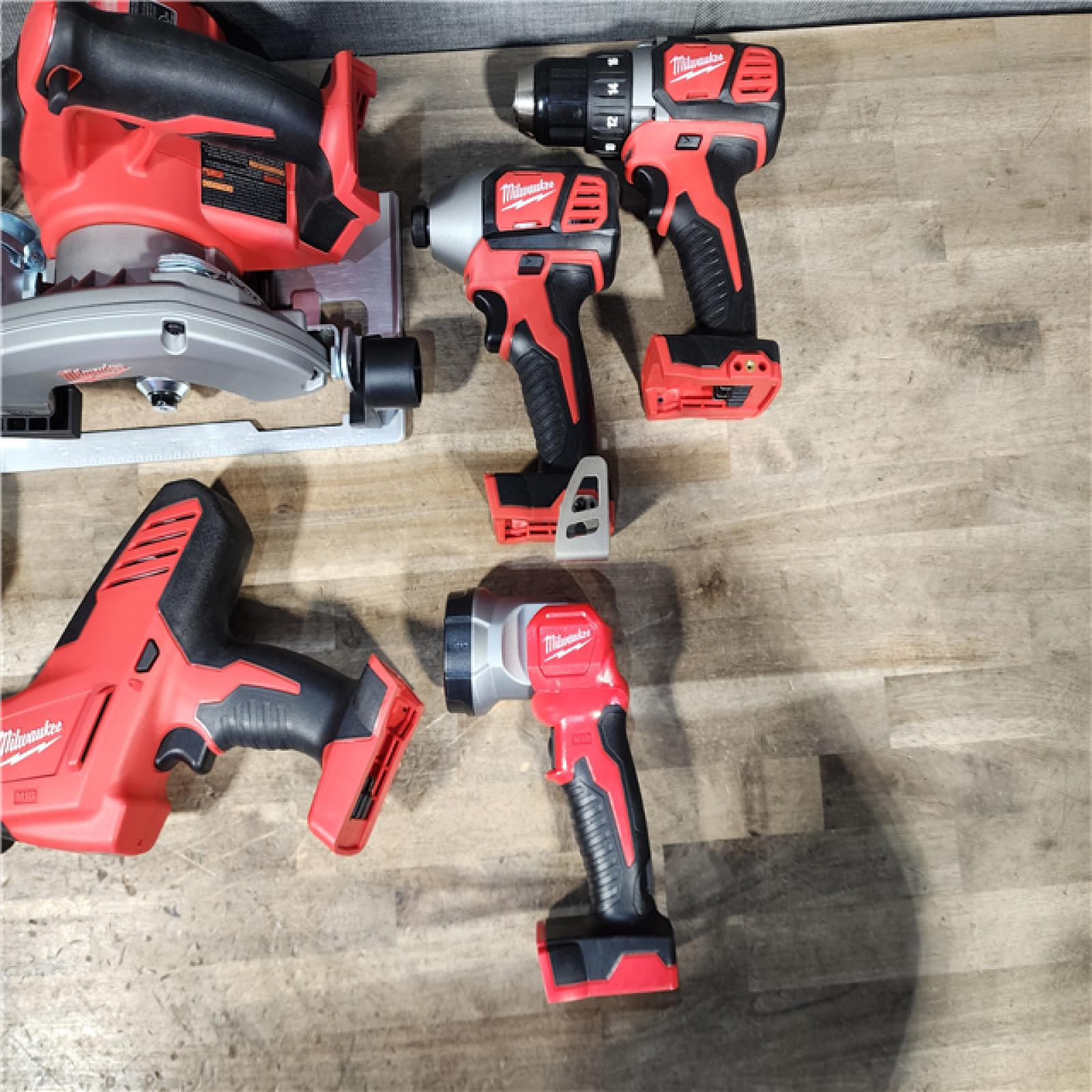 HOUSTON LOCATION - AS-IS (APPEARS LIKE NEW) Milwaukee M18 18-Volt Lithium-Ion Cordless Combo Tool Kit (5-Tool) with (1) 3.0Ah and (1) 1.5Ah Battery  (1) Charger  (1) Tool Bag