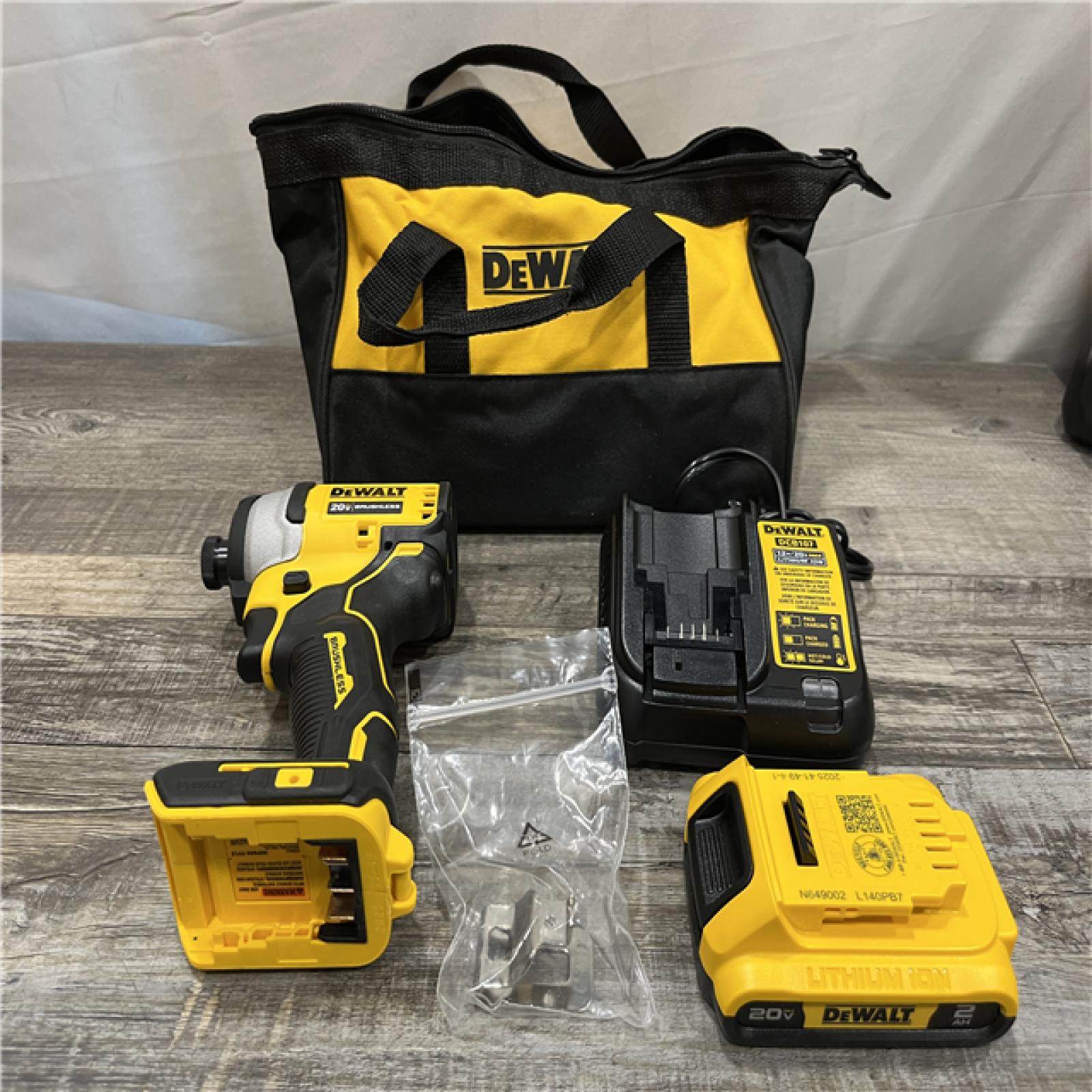 AS-IS DEWALT Atomic 20V Max Lithium-Ion Brushless Cordless Compact 1/4 in. Impact Driver Kit