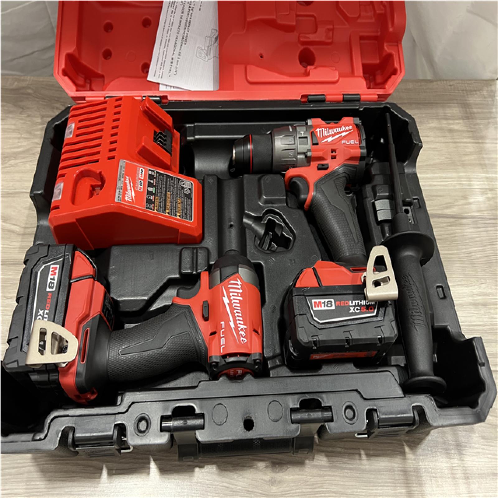 AS-IS Milwaukee FUEL 12V Lithium-Ion Brushless Battery 6 in. HATCHET Pruning Saw Kit
