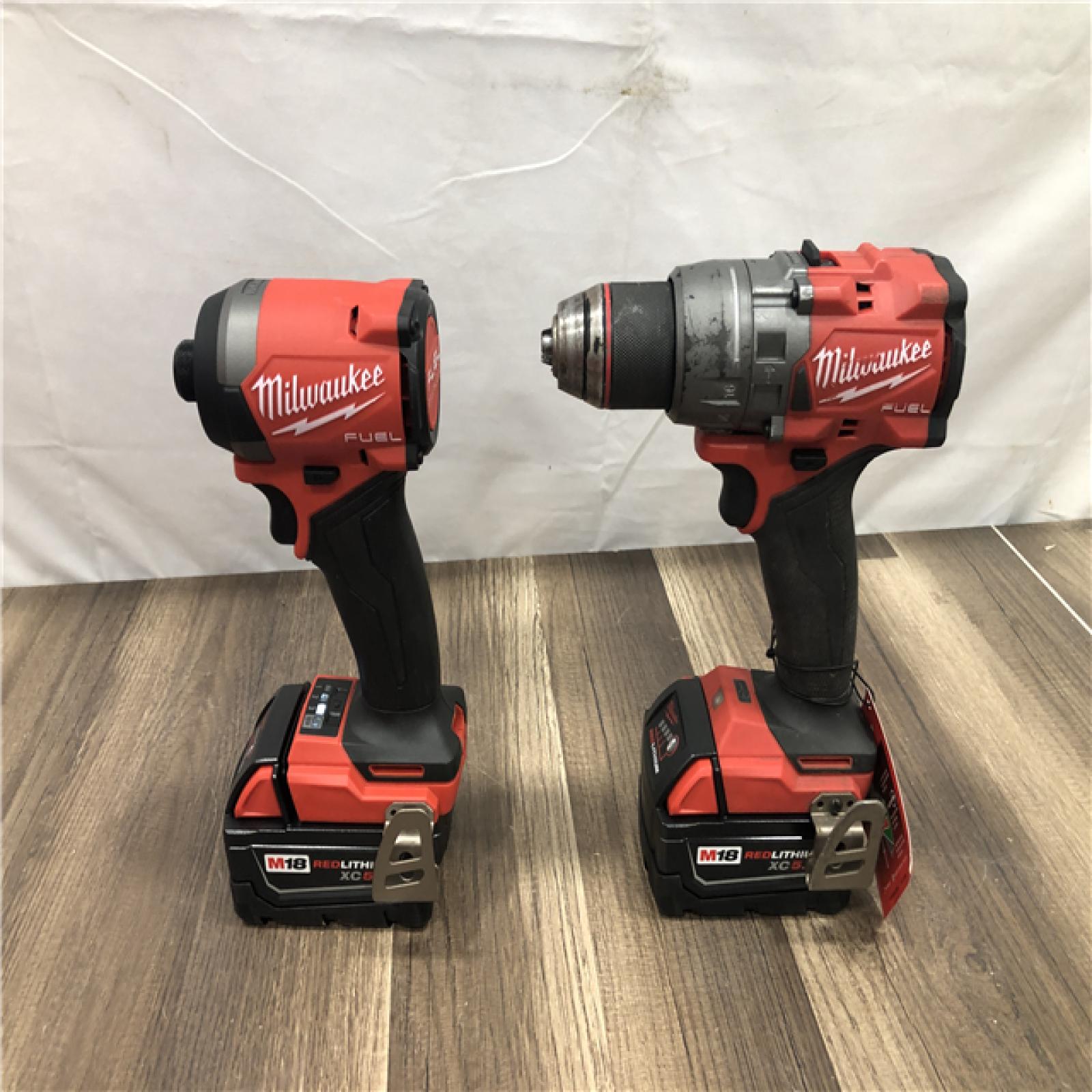 AS-IS Milwaukee FUEL 18V Lithium-Ion Brushless Cordless Hammer Drill and Impact Driver Combo Kit