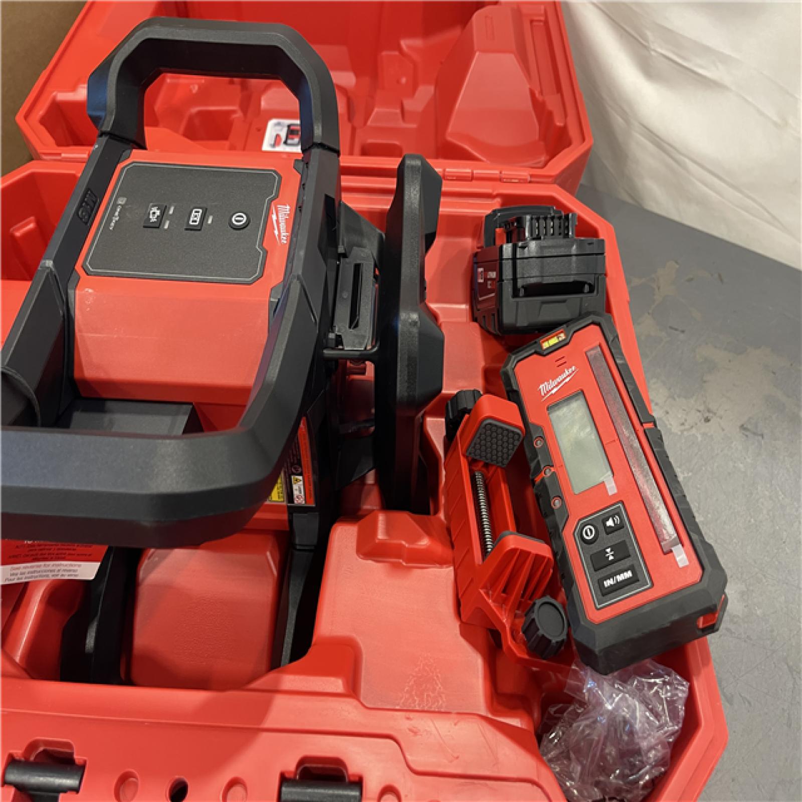 AS-IS - Milwaukee M18 2000 Ft. Red Exterior Rotary Laser Level Kit with Receiver and Receiver Clamp