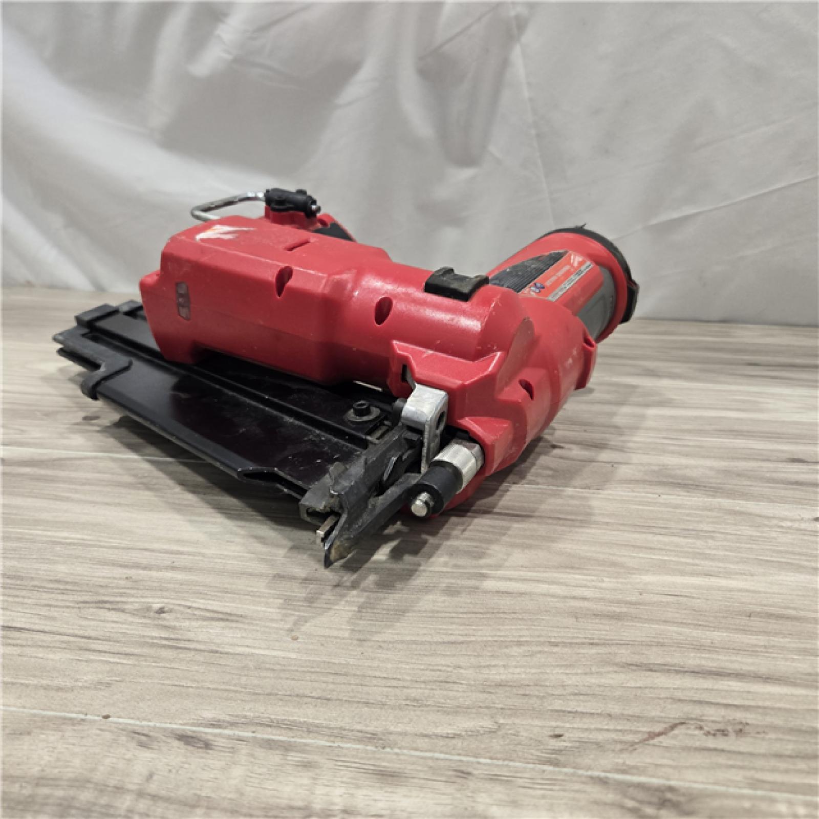 AS-IS Milwaukee 2744-20 M18 FUEL 3-1/2 in. 18V 21-Degree Cordless Framing Nailer (Tool-Only)