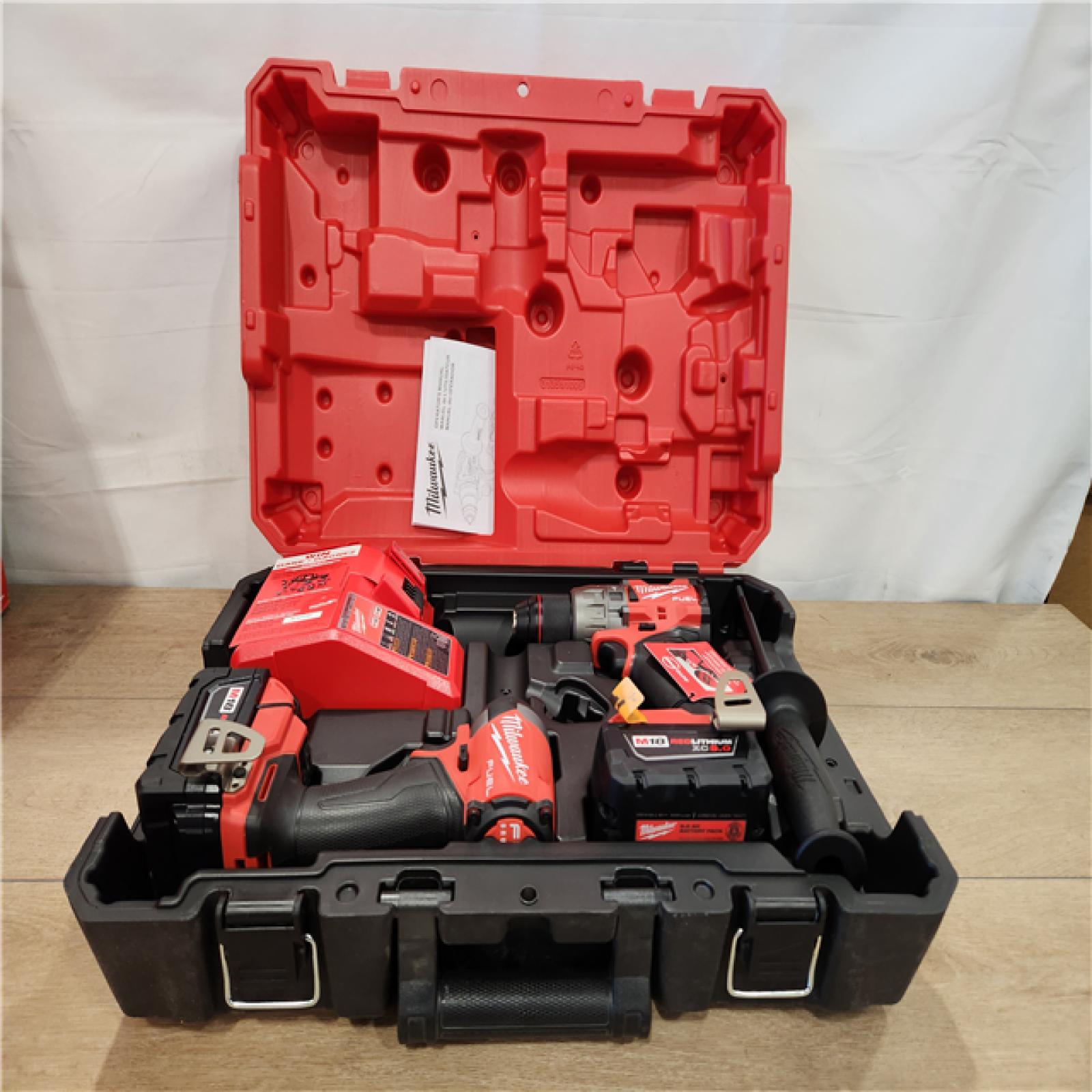 AS-IS- Milwaukee FUEL 18V Lithium-Ion Brushless Cordless Hammer Drill and Impact Driver Combo Kit