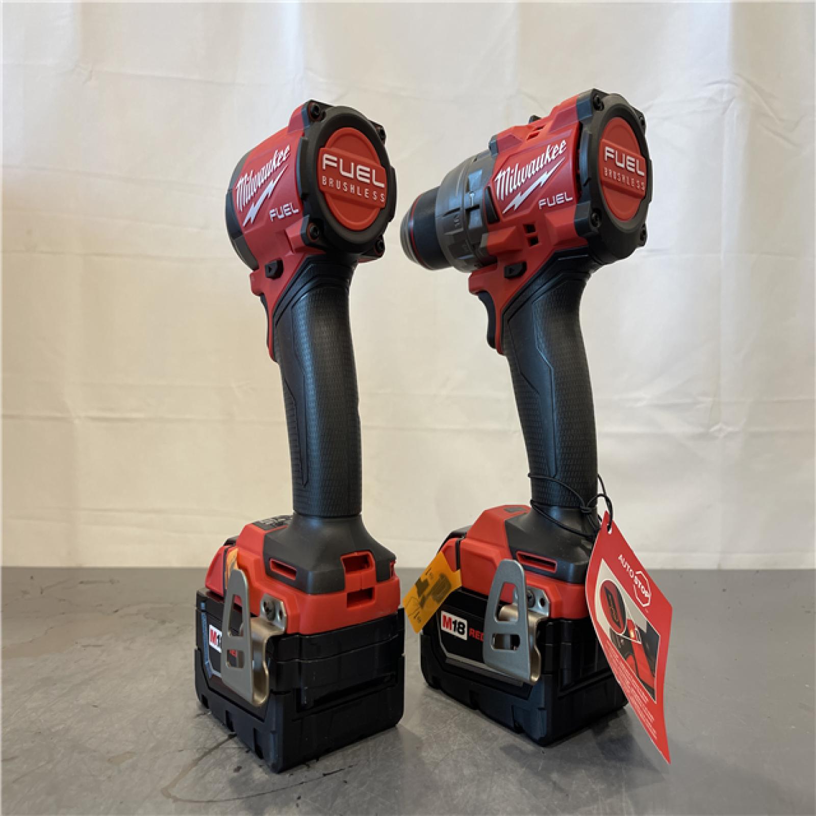 AS-IS - MILWAUKEE FUEL 18V Lithium-Ion Brushless Cordless Hammer Drill and Impact Driver Combo Kit