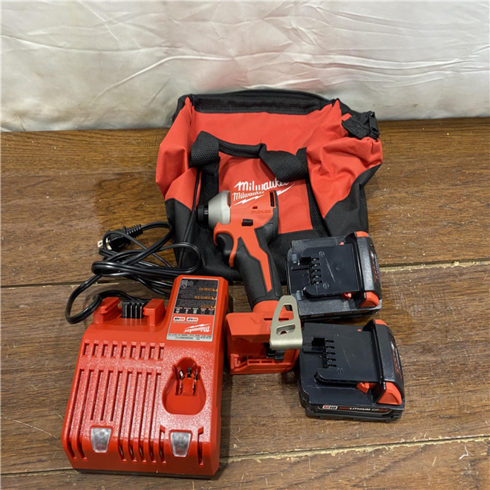 AS-IS Milwaukee M18 Compact Brushless 1/4  Hex Impact Driver Kit