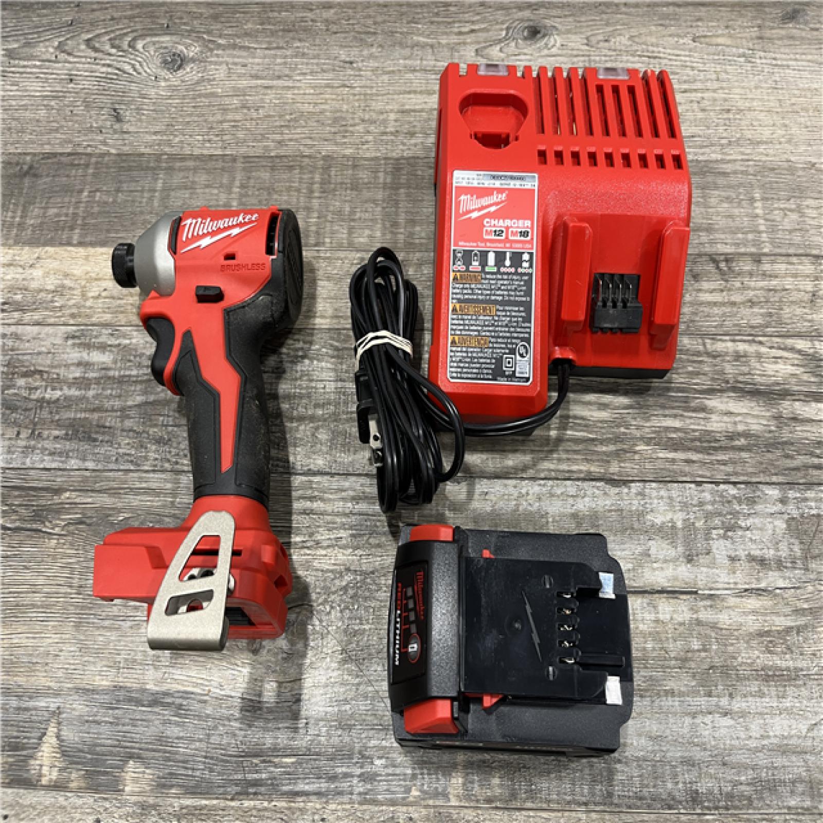 AS-IS Milwaukee 18V Lithium-Ion Compact Brushless Cordless 1/4 in. Impact Driver Kit