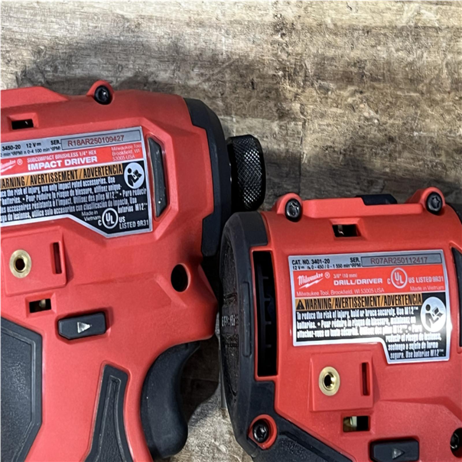 Houston Locations AS-IS Milwaukee Drill Driver and Impact Driver and Pin Nailer and Batteries QTY/2 with Charger