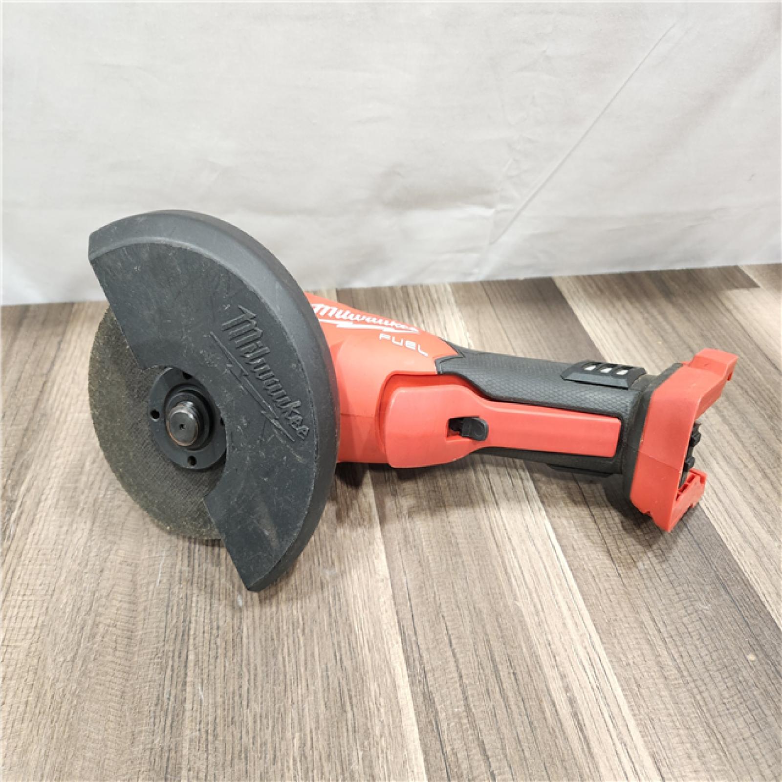 AS-IS- Milwaukee M18 FUEL 18V Lithium-Ion Brushless Cordless 4-1/2 in./5 in. Grinder with Variable Speed & Paddle Switch (Tool-Only)