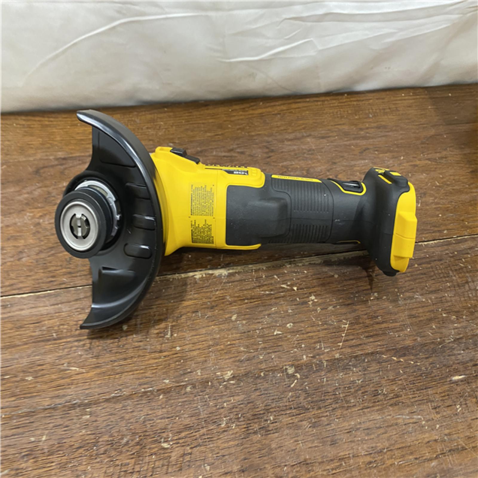 AS-IS DeWalt DCG405B 20V Max XR 4.5-Inch Slide Switch Small Angle Grinder (Tool Only)