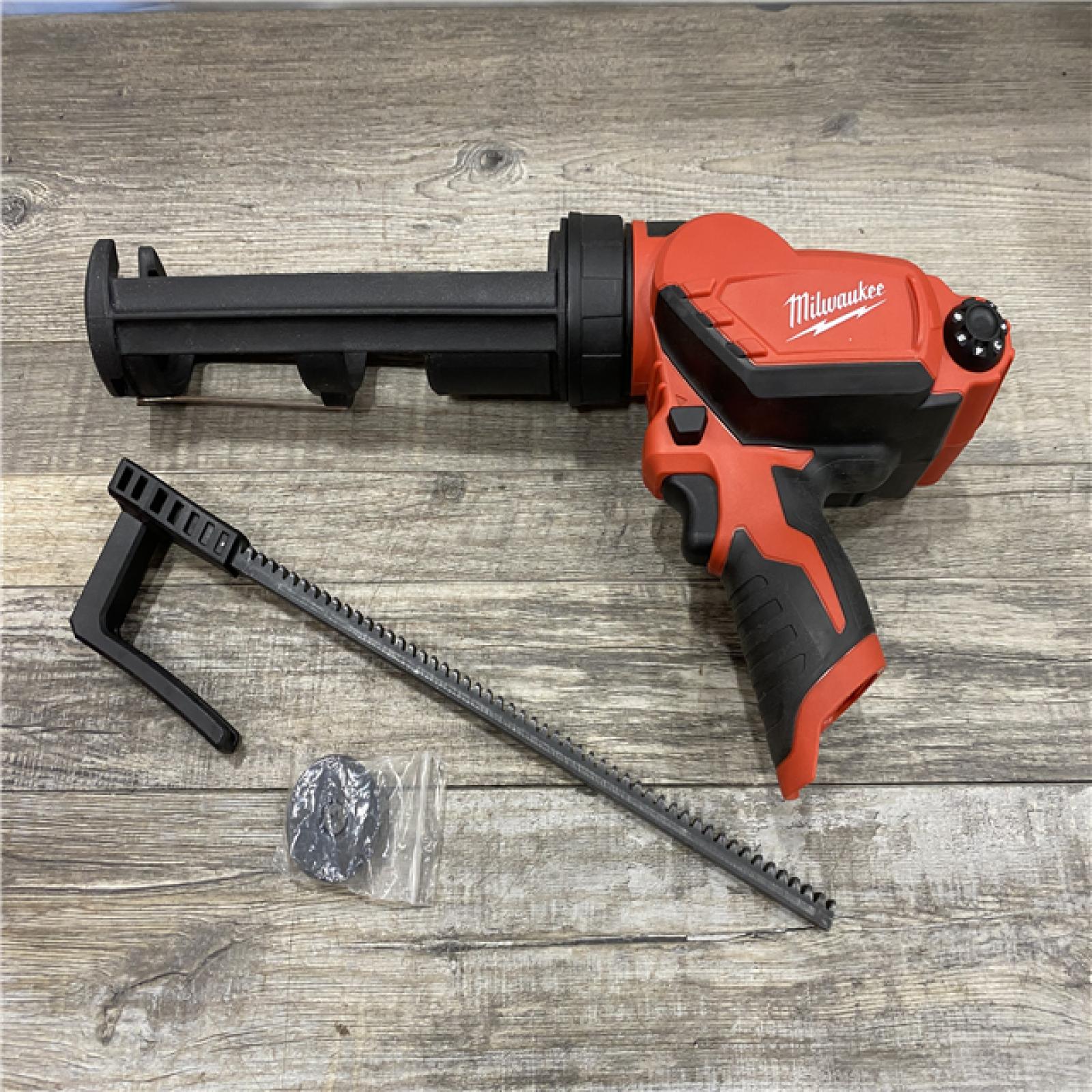 AS-IS Milwaukee 12V Lithium-Ion Cordless 10 oz. Adhesive and Caulk Gun (Tool-Only)