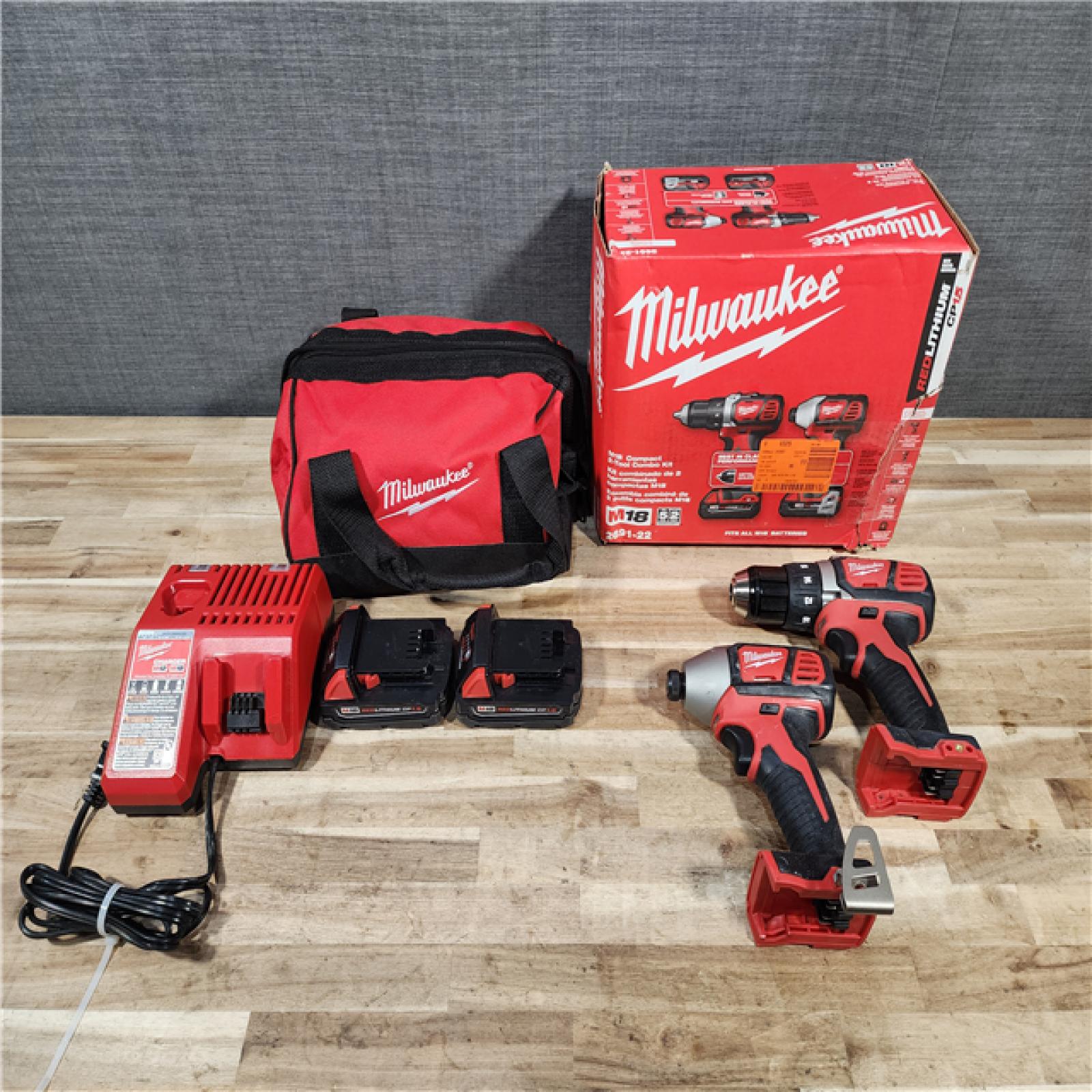 HOUSTON LOCATION - AS-IS Milwaukee M18 Brushed Cordless (2-Tool) Drill/Driver and Impact Driver Kit