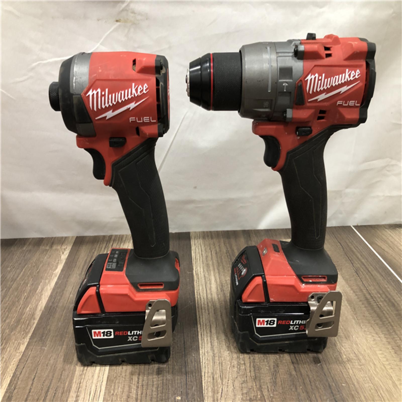 AS-IS Milwaukee FUEL 18V Lithium-Ion Brushless Cordless Hammer Drill and Impact Driver Combo Kit