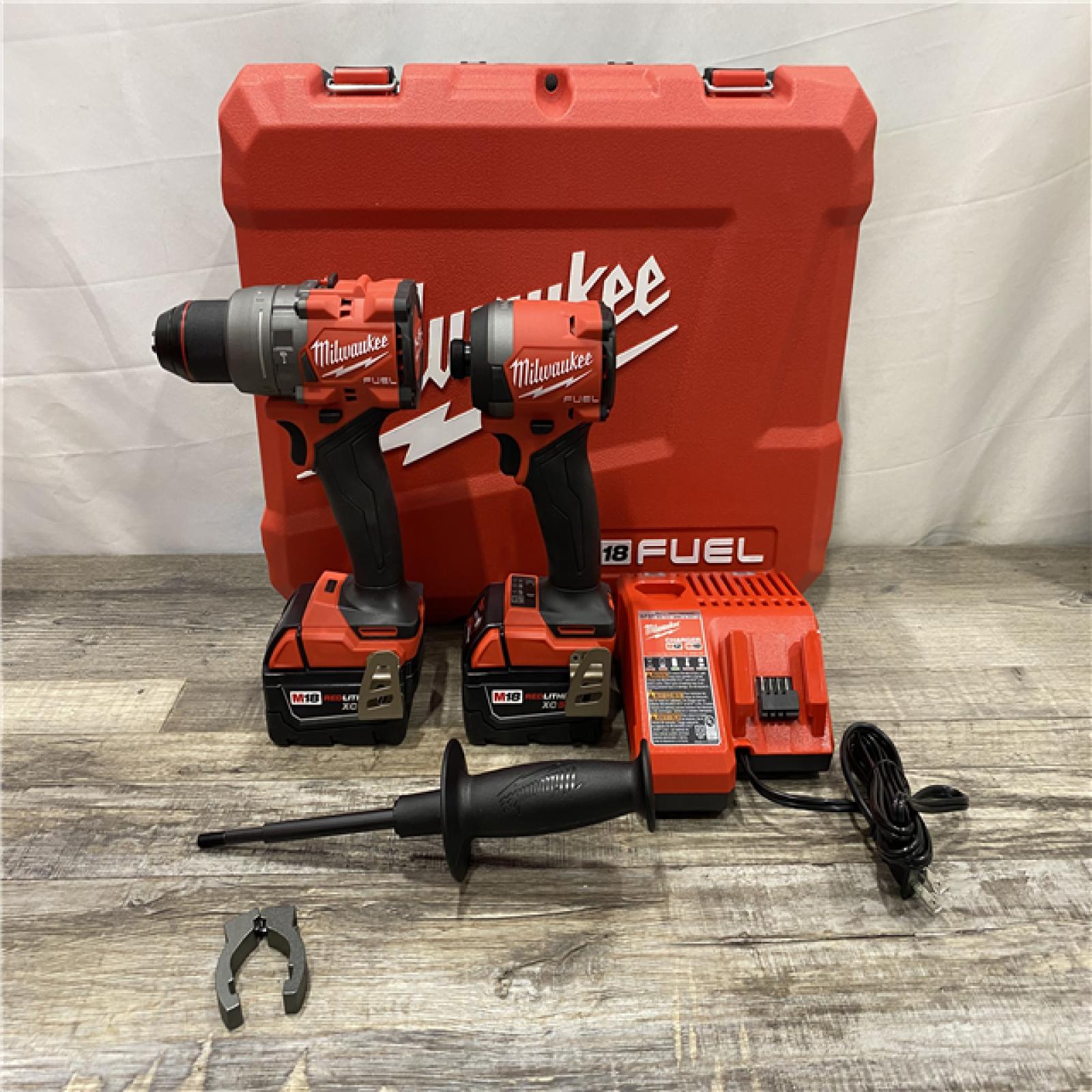 AS-IS Milwaukee FUEL 18V Lithium-Ion Brushless Cordless Hammer Drill and Impact Driver Combo Kit