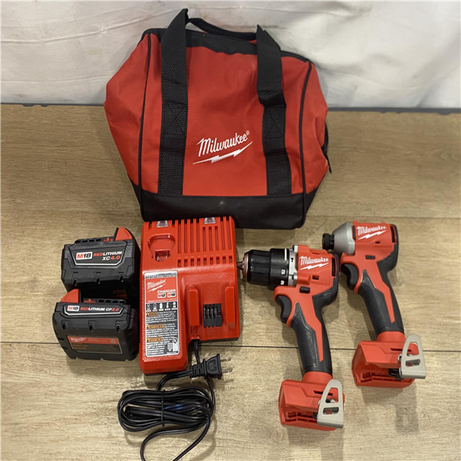 AS-IS Milwaukee 18-Volt Lithium-Ion Brushless Cordless Compact Hammer Drill/Impact Combo Kit