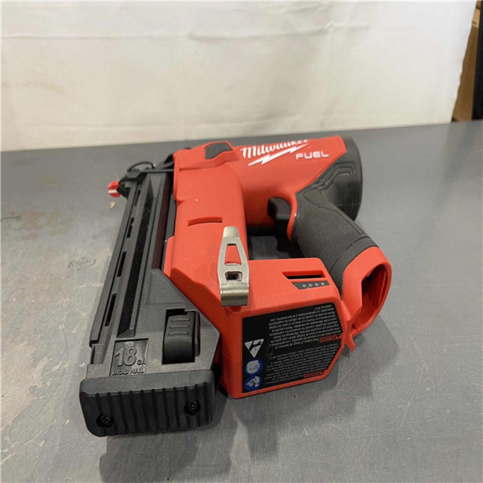 AS-IS - M12 FUEL 12-Volt Lithium-Ion Brushless Cordless 18-Guage Compact Brad Nailer
