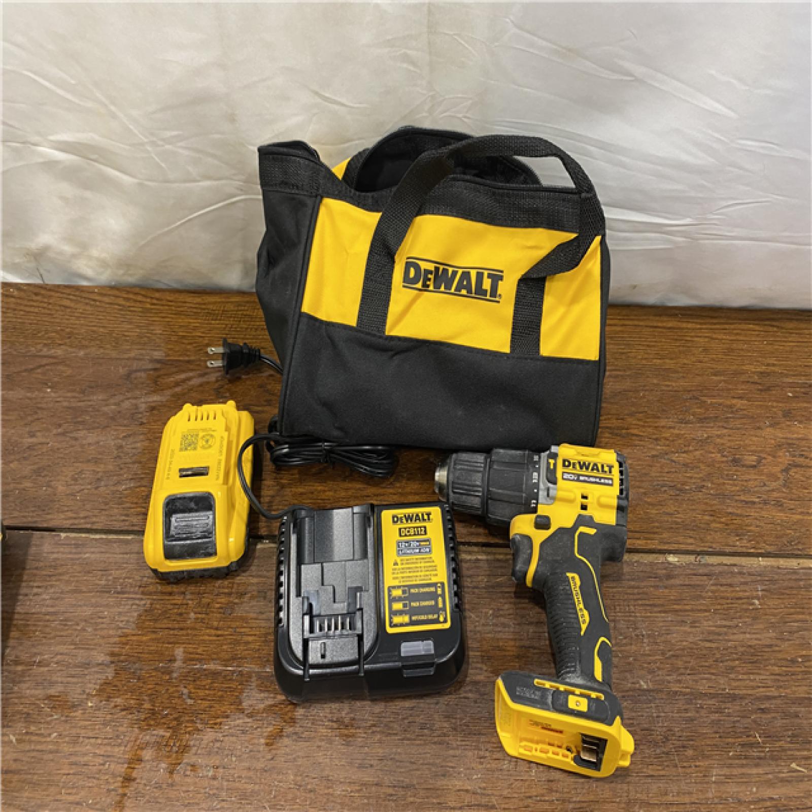 AS-IS DEWALT ATOMIC 20-Volt Lithium-Ion Cordless 1/2 in. Compact Hammer Drill with 3.0Ah Battery, Charger and Bag