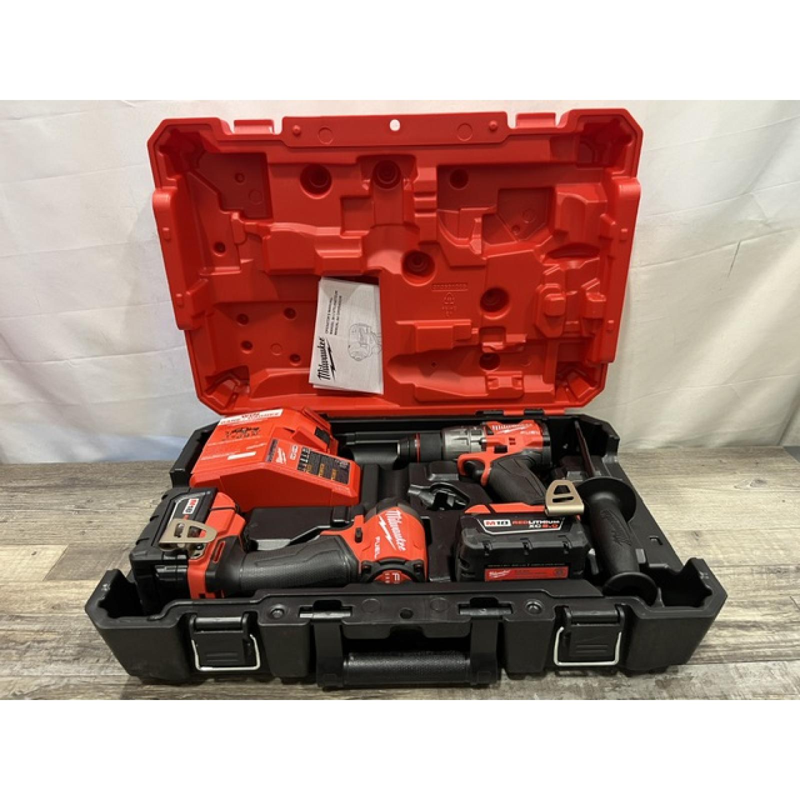 AS-IS Milwaukee FUEL 18V Lithium-Ion Brushless Cordless Hammer Drill and Impact Driver Combo Kit