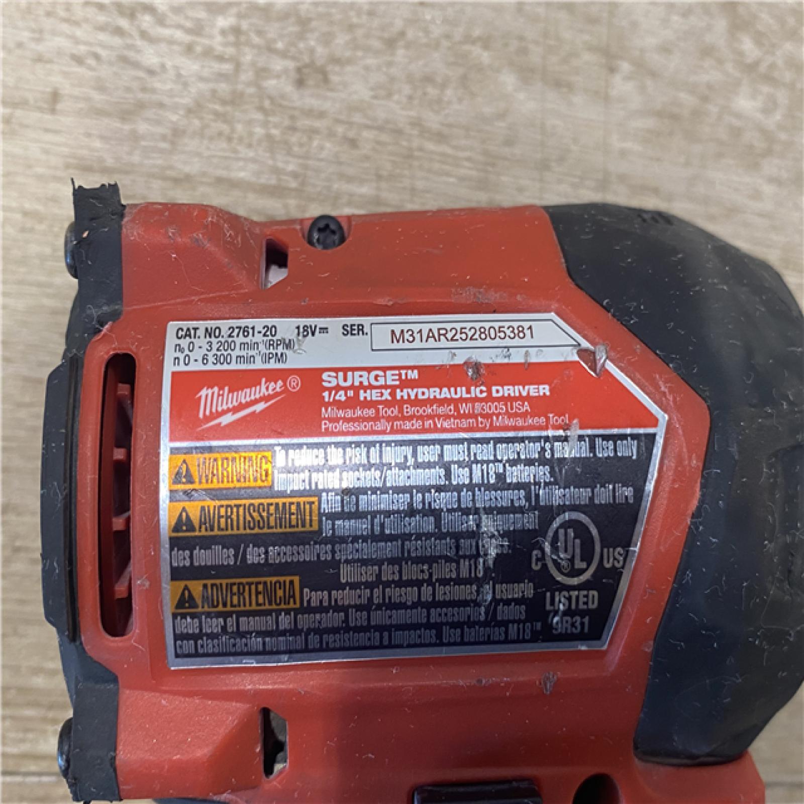 AS-IS Milwaukee FUEL SURGE 18V Lithium-Ion Brushless Cordless 1/4 in. Hex Impact Driver (Tool-Only)