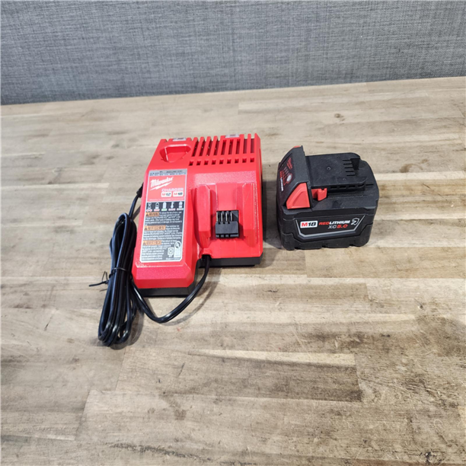 HOUSTON LOCATION - AS-IS Milwaukee M18 1/2 in. Cordless Brushless High Torque Impact Wrench Kit (Battery & Charger)