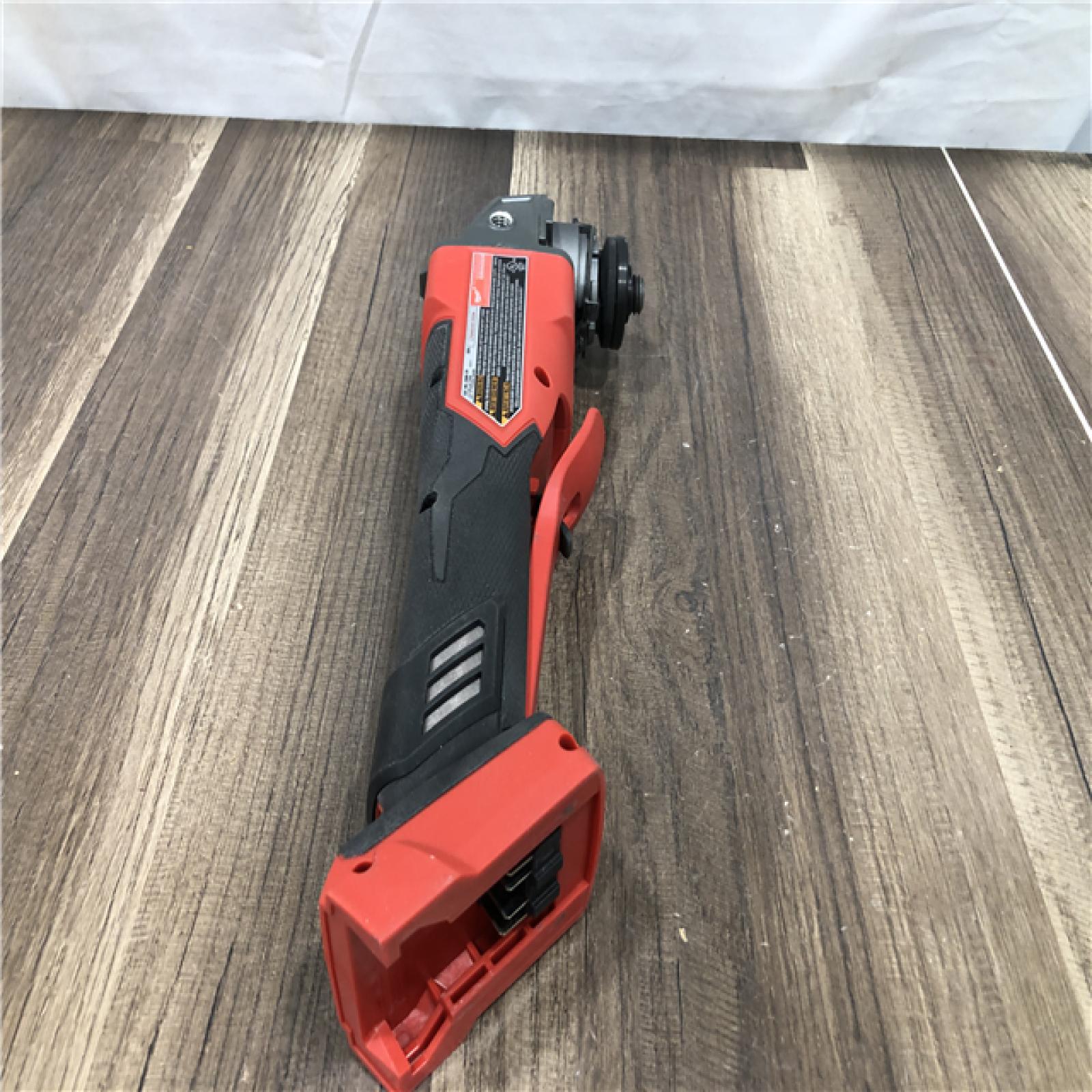 AS-IS Milwaukee FUEL 18V Lithium-Ion Brushless Cordless 4-1/2 in./5 in. Grinder with Variable Speed & Paddle Switch (Tool-Only)