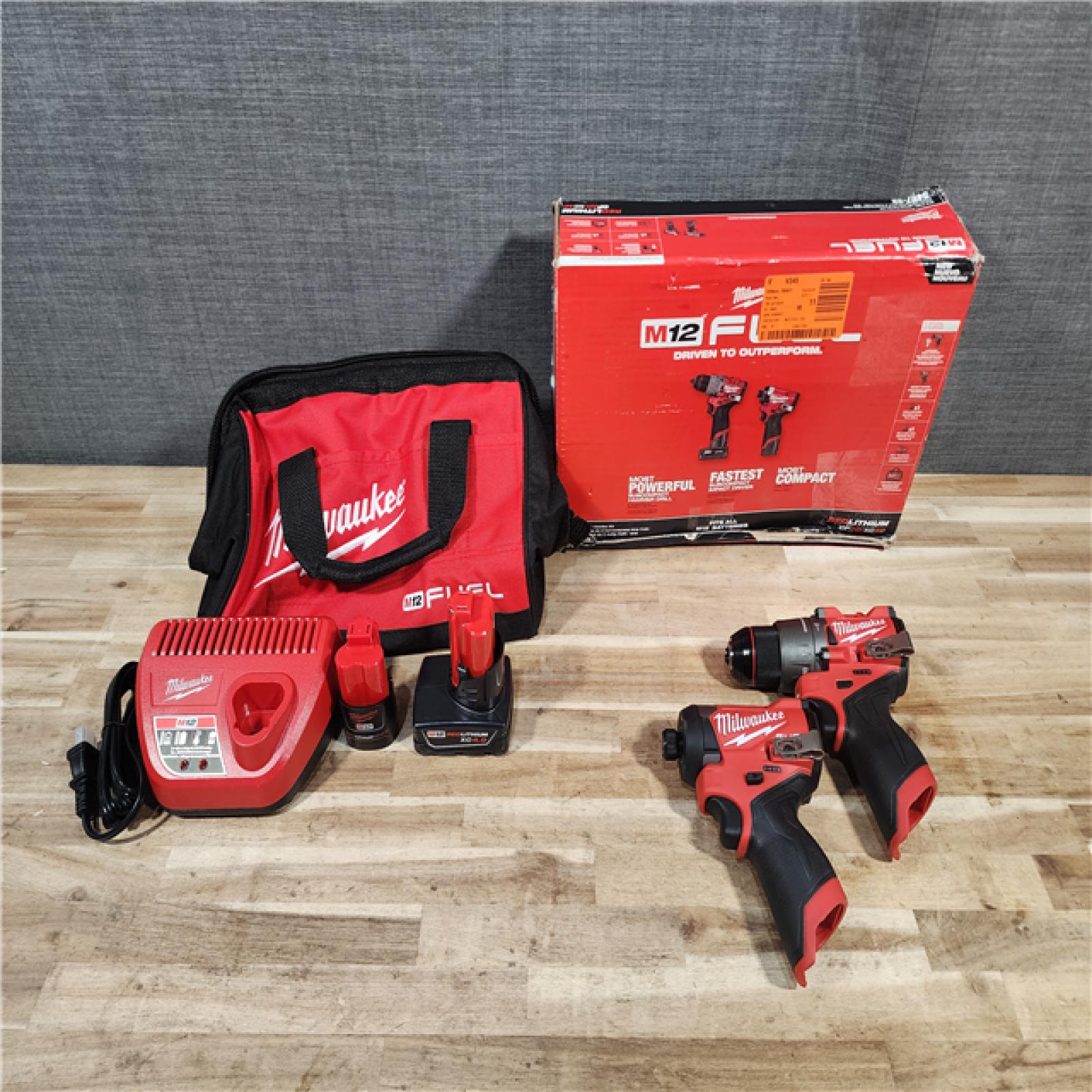 HOUSTON LOCATION - AS-IS Milwaukee  FUEL 12-Volt Lithium-Ion Brushless Cordless Hammer Drill and Impact Driver Combo Kit