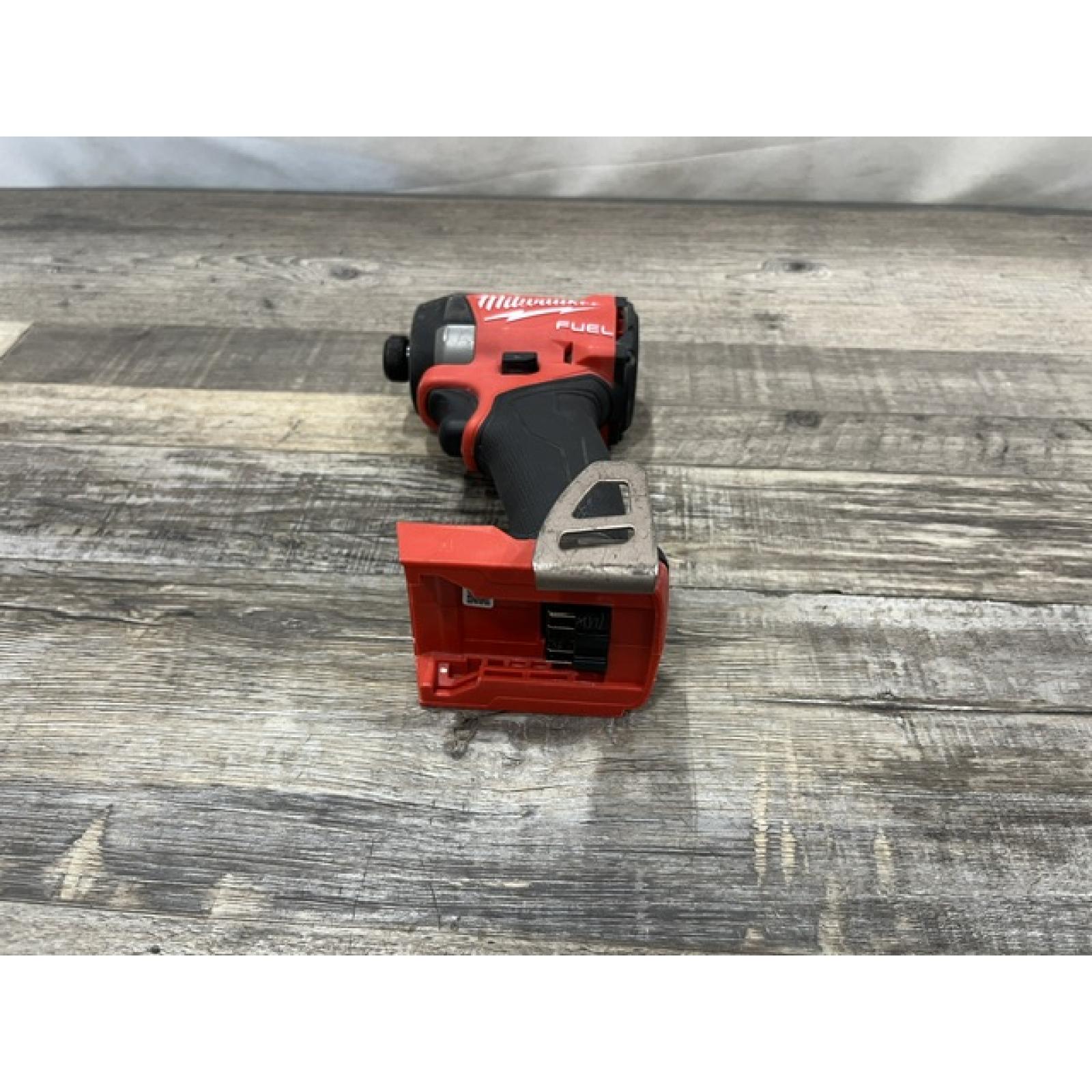 AS-IS Milwaukee FUEL 18V Lithium-Ion Brushless Cordless 1/4 in. Hex Impact Driver (Tool-Only)