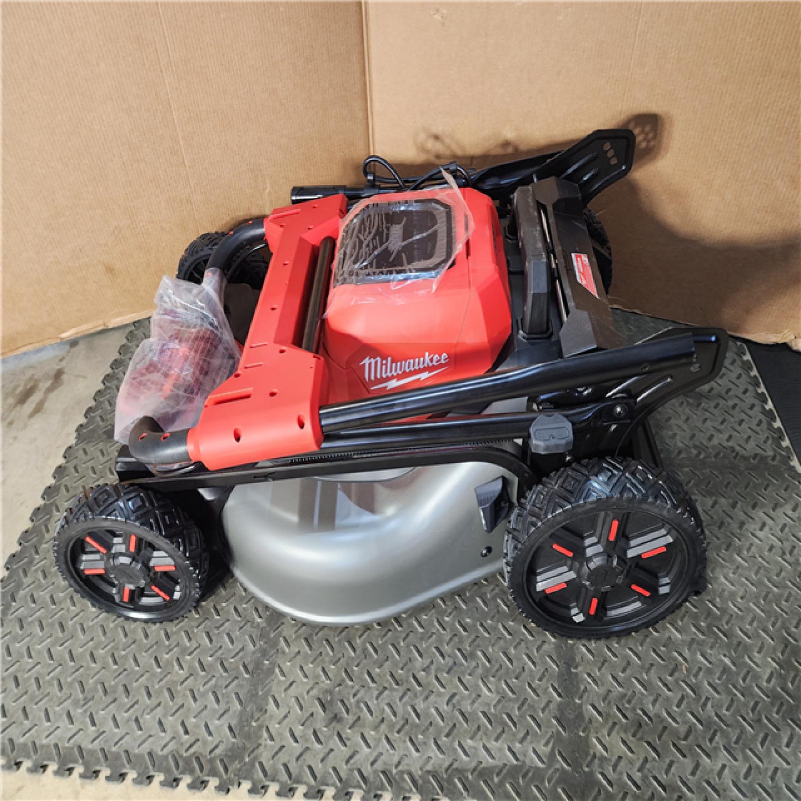 HOUSTON LOCATION - AS-IS M18 FUEL Brushless Cordless 21 in. Walk Behind Dual Battery Self-Propelled Mower W/(2) 12.0Ah Battery and Rapid Charger