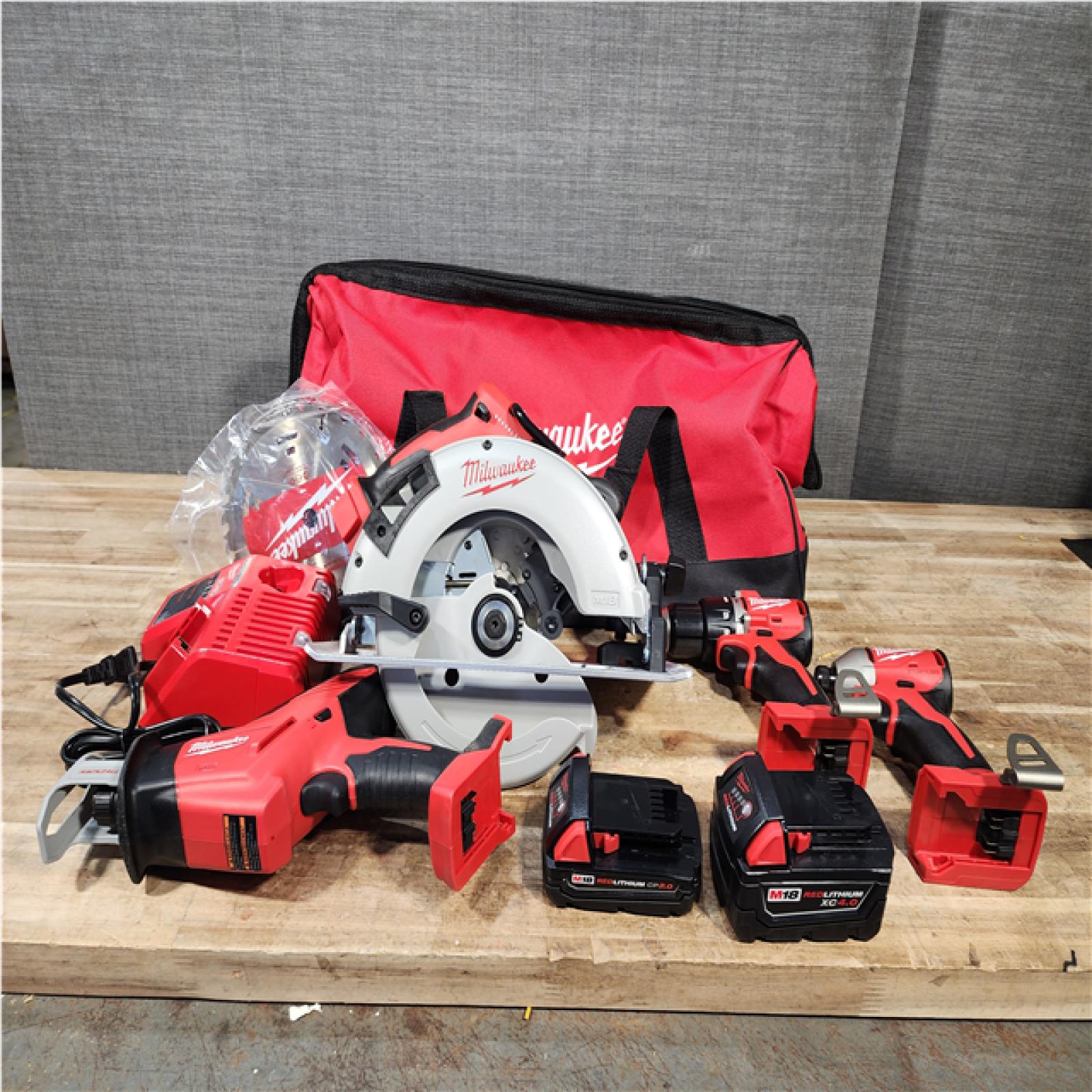 Houston Location AS-IS Milwaukee 18-Volt Lithium-Ion Brushless Cordless (4-Tool) Combo Kit