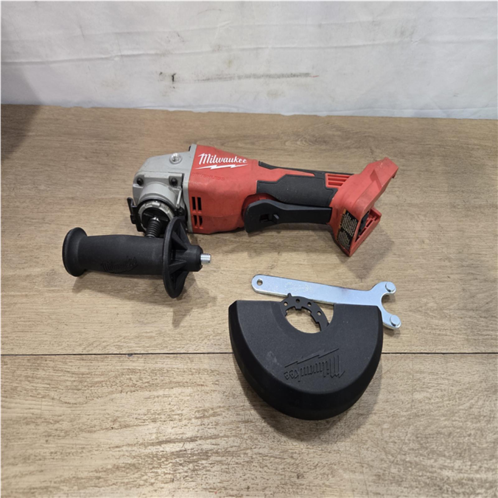 AS-IS Milwaukee 18V Lithium-Ion Brushless Cordless 4-1/2 in./5 in. Grinder w/Paddle Switch (Tool-Only)