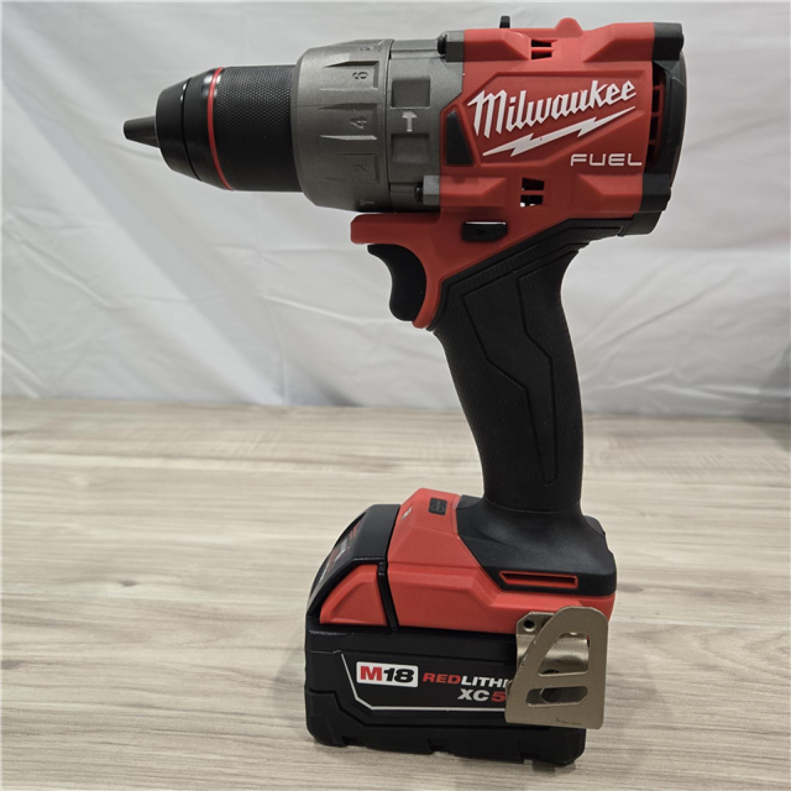 AS-IS MILWAUKEE FUEL 18V Lithium-Ion Brushless Cordless Hammer Drill and Impact Driver Combo Kit (2-Tool) with 2 Batteries