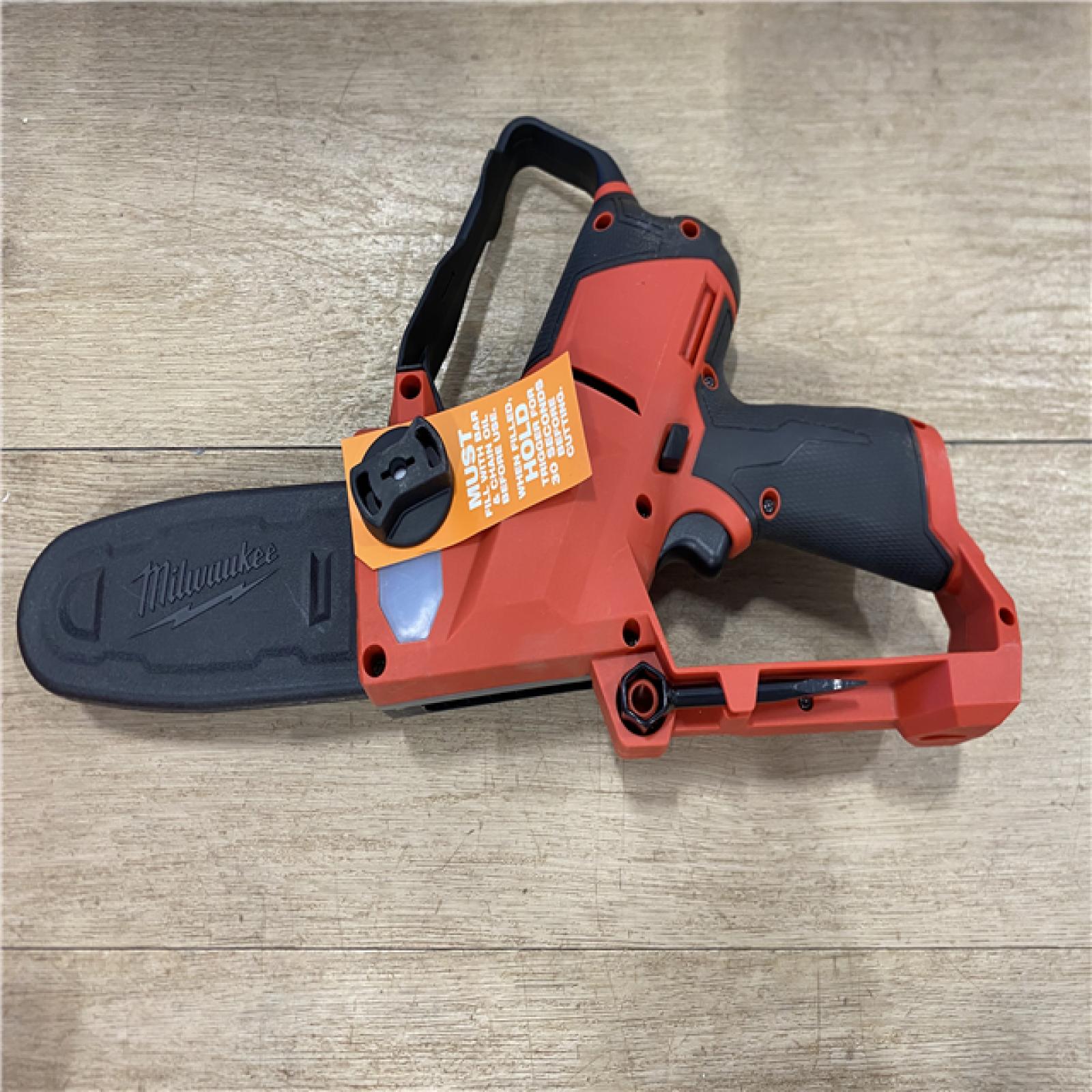 AS-IS Milwaukee FUEL 12V Lithium-Ion Brushless Battery 6 in. HATCHET Pruning Saw Kit