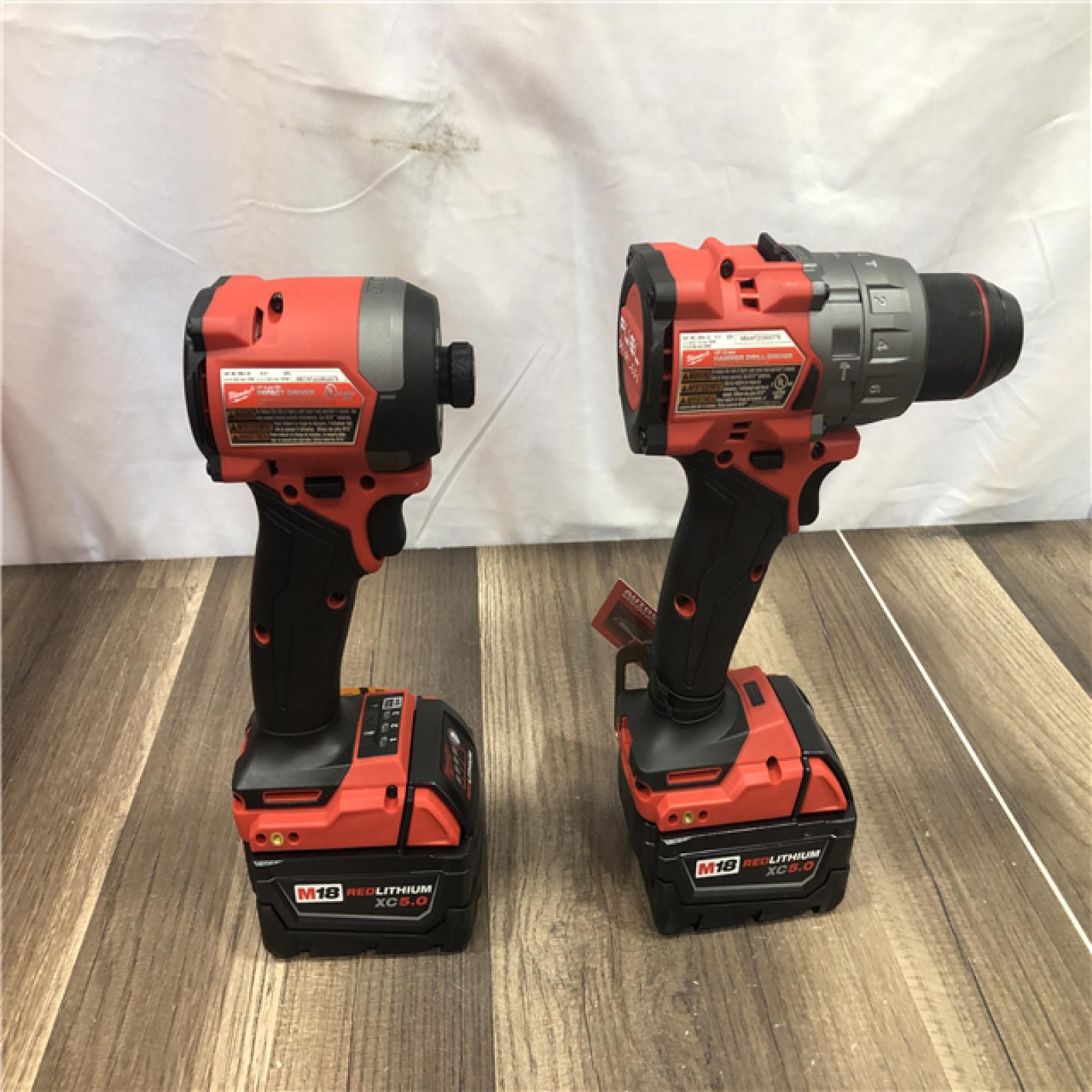 AS-IS Milwaukee FUEL 18V Lithium-Ion Brushless Cordless Hammer Drill and Impact Driver Combo Kit