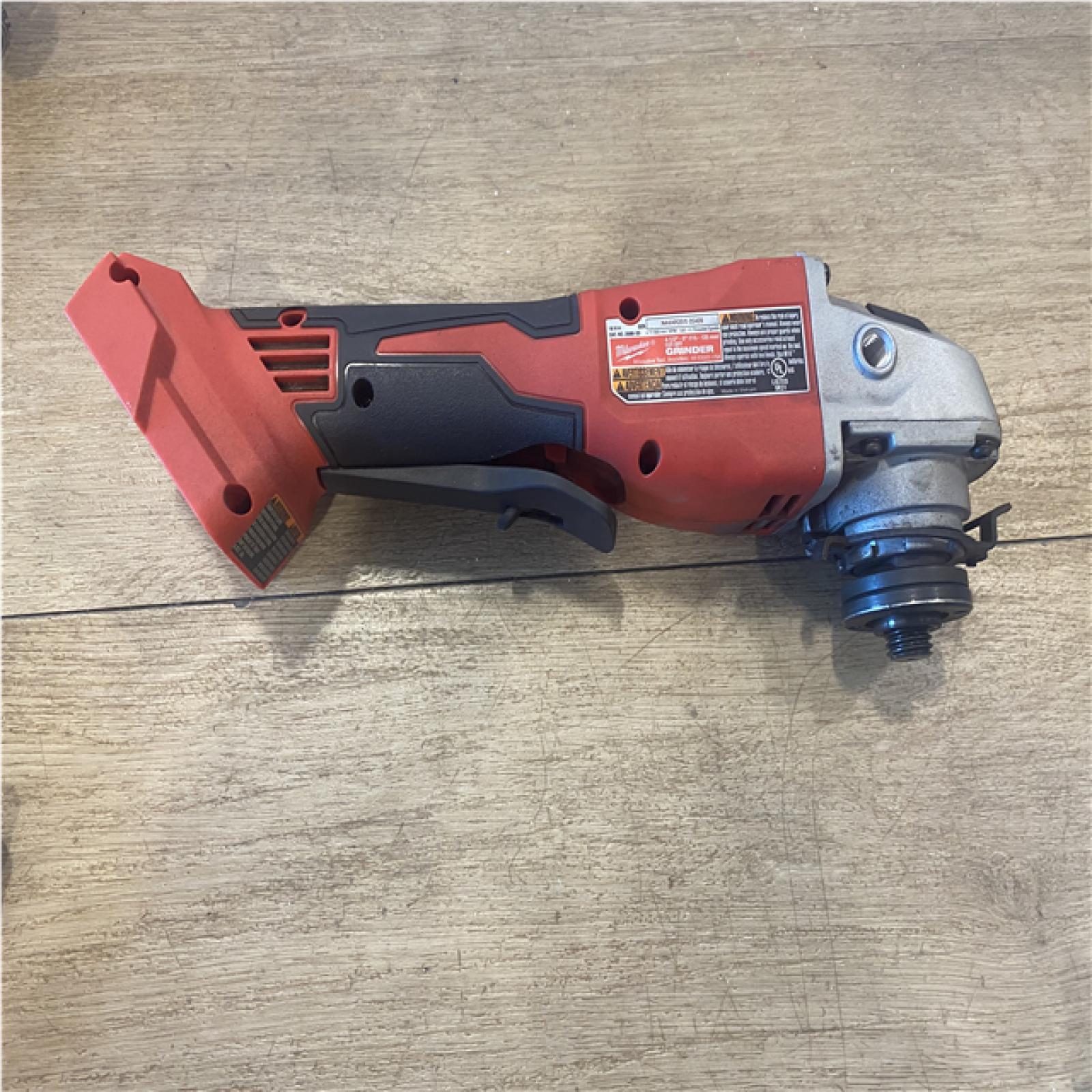 as-is Milwaukee 18V Lithium-Ion Brushless Cordless 4-1/2 in./5 in. Grinder w/Paddle Switch (Tool-Only)