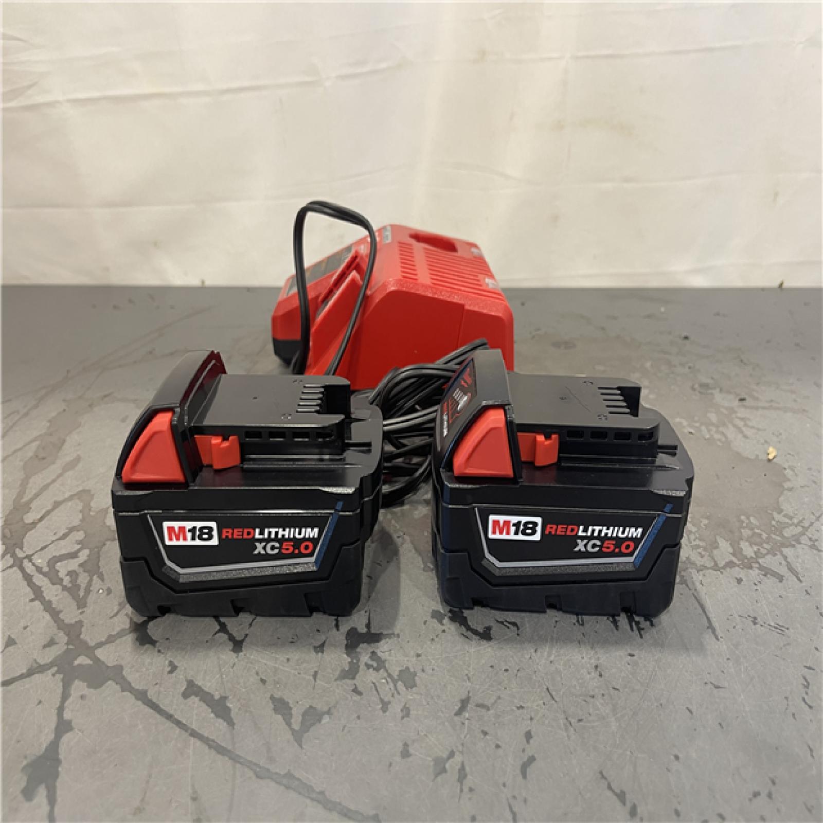 AS-IS- M18 18-Volt Lithium-Ion XC Starter Kit with Two 5.0Ah Batteries and Charger