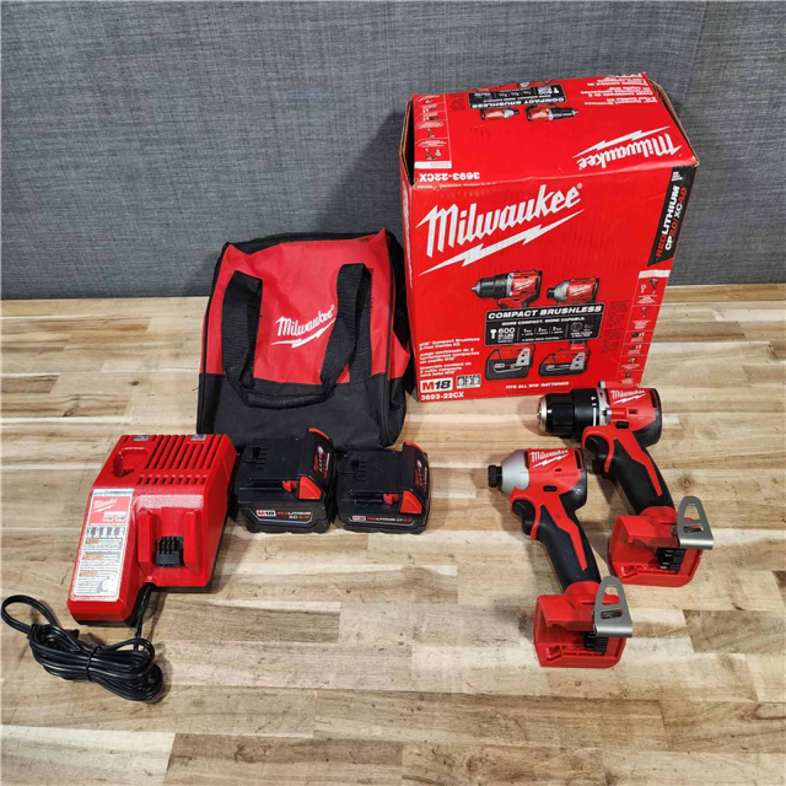 HOUSTON LOCATION - AS-IS M18 18-Volt Lithium-Ion Brushless Cordless Compact Hammer Drill/Impact Combo Kit (2-Tool) with (2) Batteries  Bag