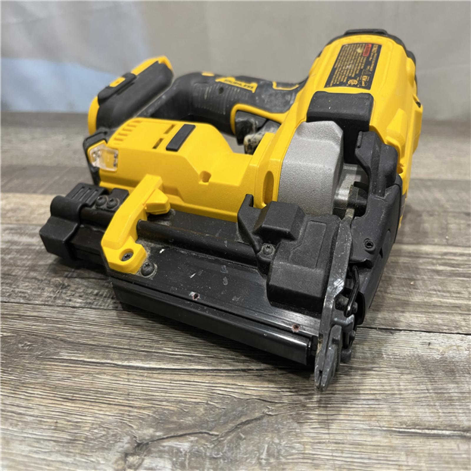AS-IS DEWALT ATOMIC 20V MAX Lithium Ion Cordless 23 Gauge Pin Nailer (Tool Only)