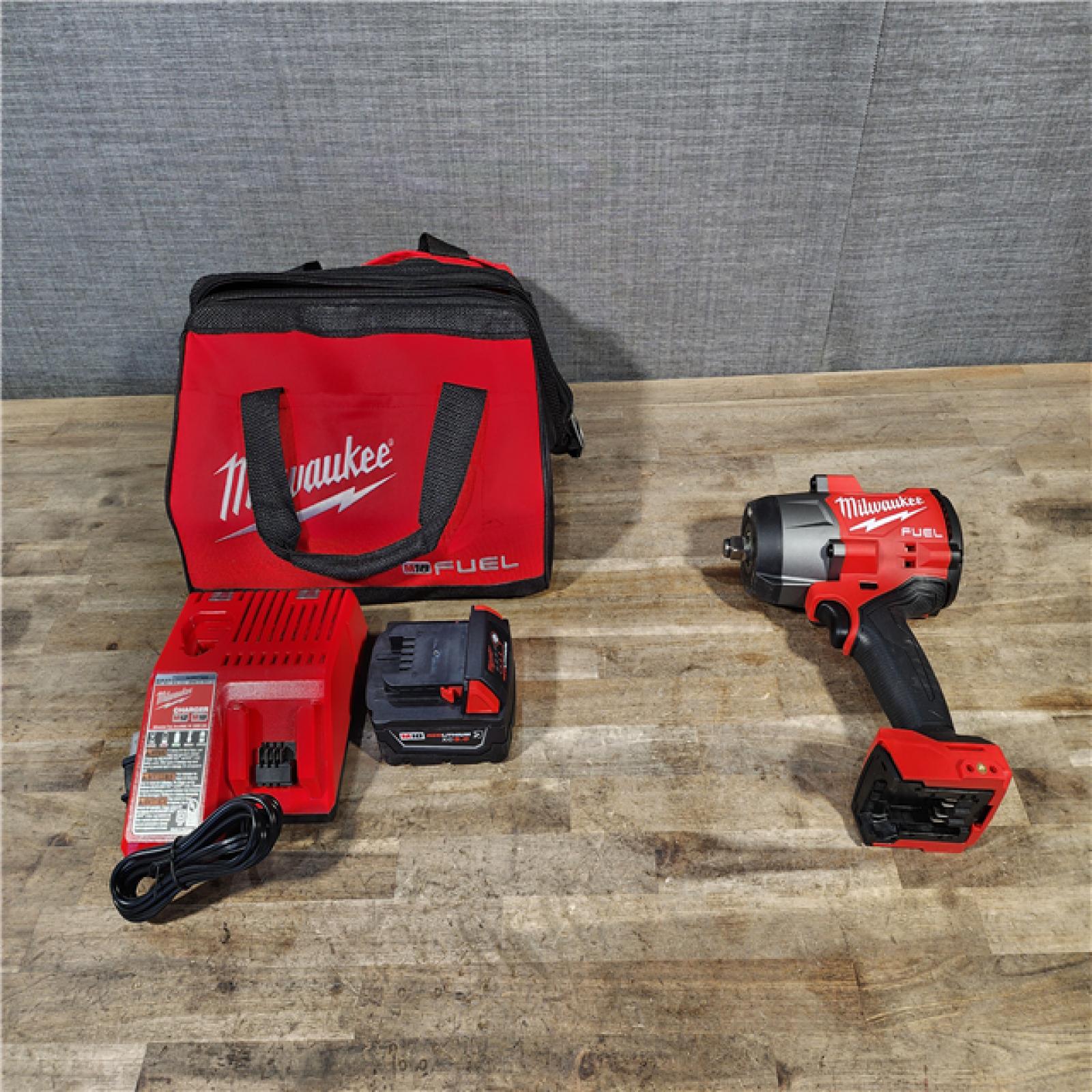 HOUSTON LOCATION - AS-IS Milwaukee M18 1/2 in. Cordless Brushless High Torque Impact Wrench Kit (Battery & Charger)