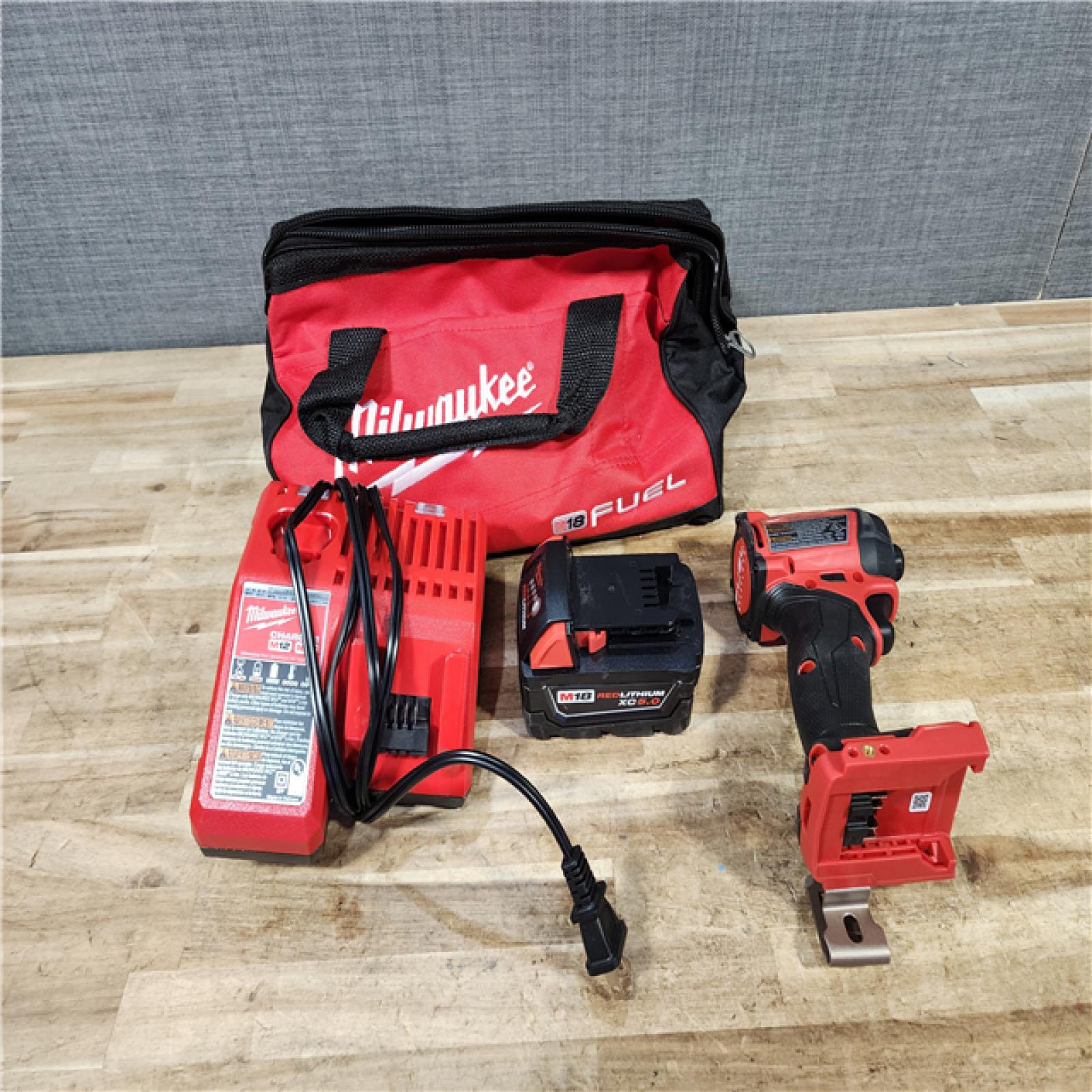 HOUSTON LOCATION - AS - IS Milwaukee FUEL SURGE 18V Lithium-Ion Brushless Cordless 1/4 in. Hex Impact Driver Kit